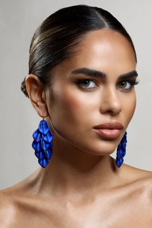 Hummingbird | Blue Petal Dangle Earrings sold by Club L London