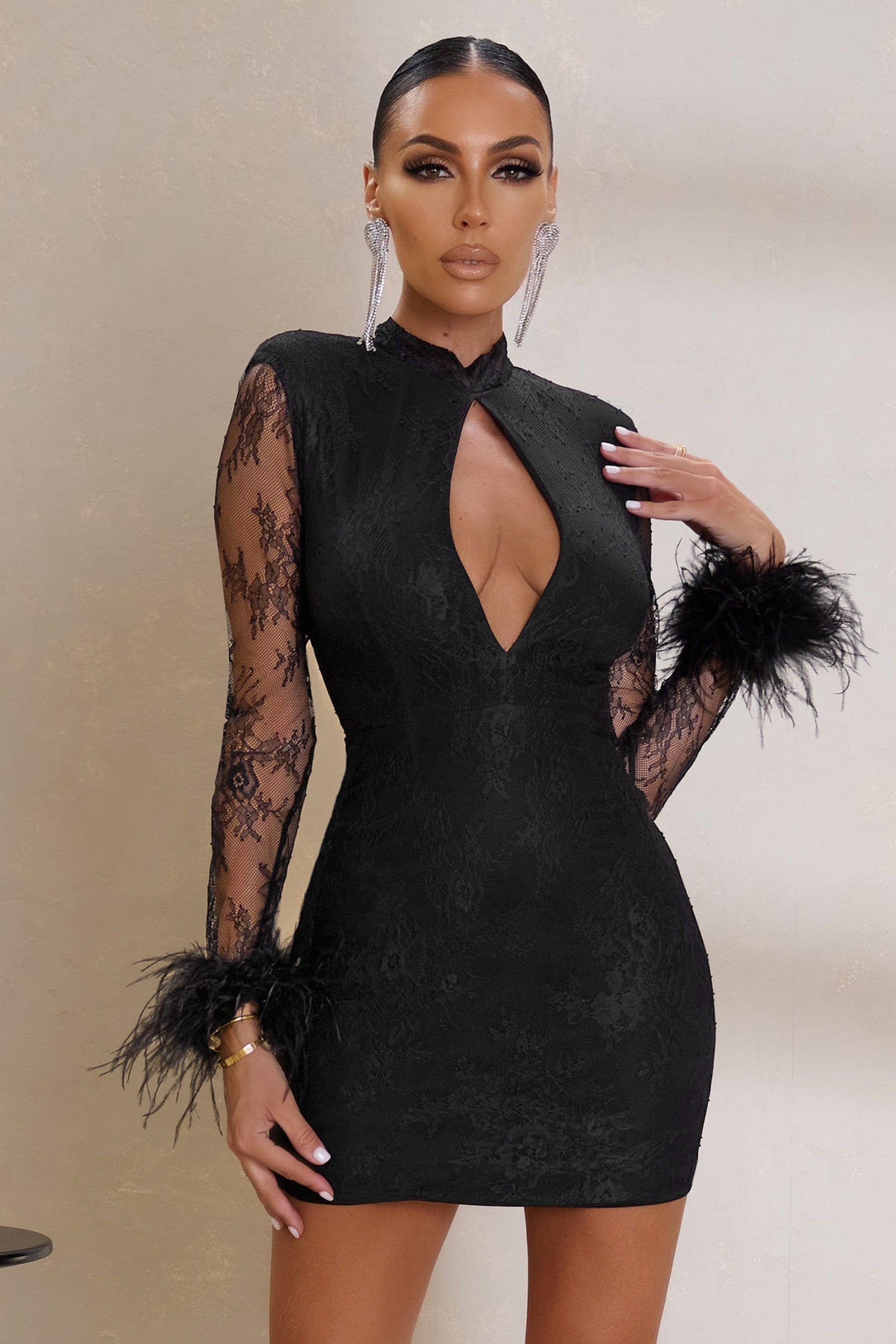 Enamored | Black Lace Mini Dress With Keyhole And Feather Trim Cuff sold by Club L London