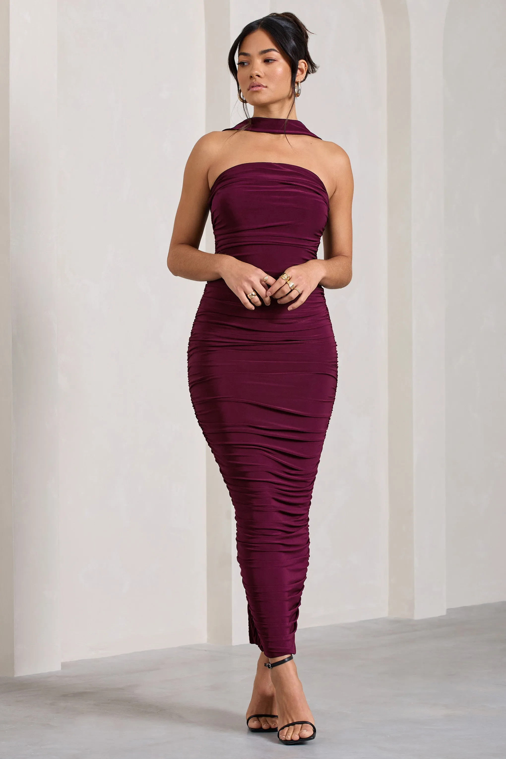 Entranced | Burgundy Ruched Bandeau Maxi Dress With Halter Collar sold by Club L London