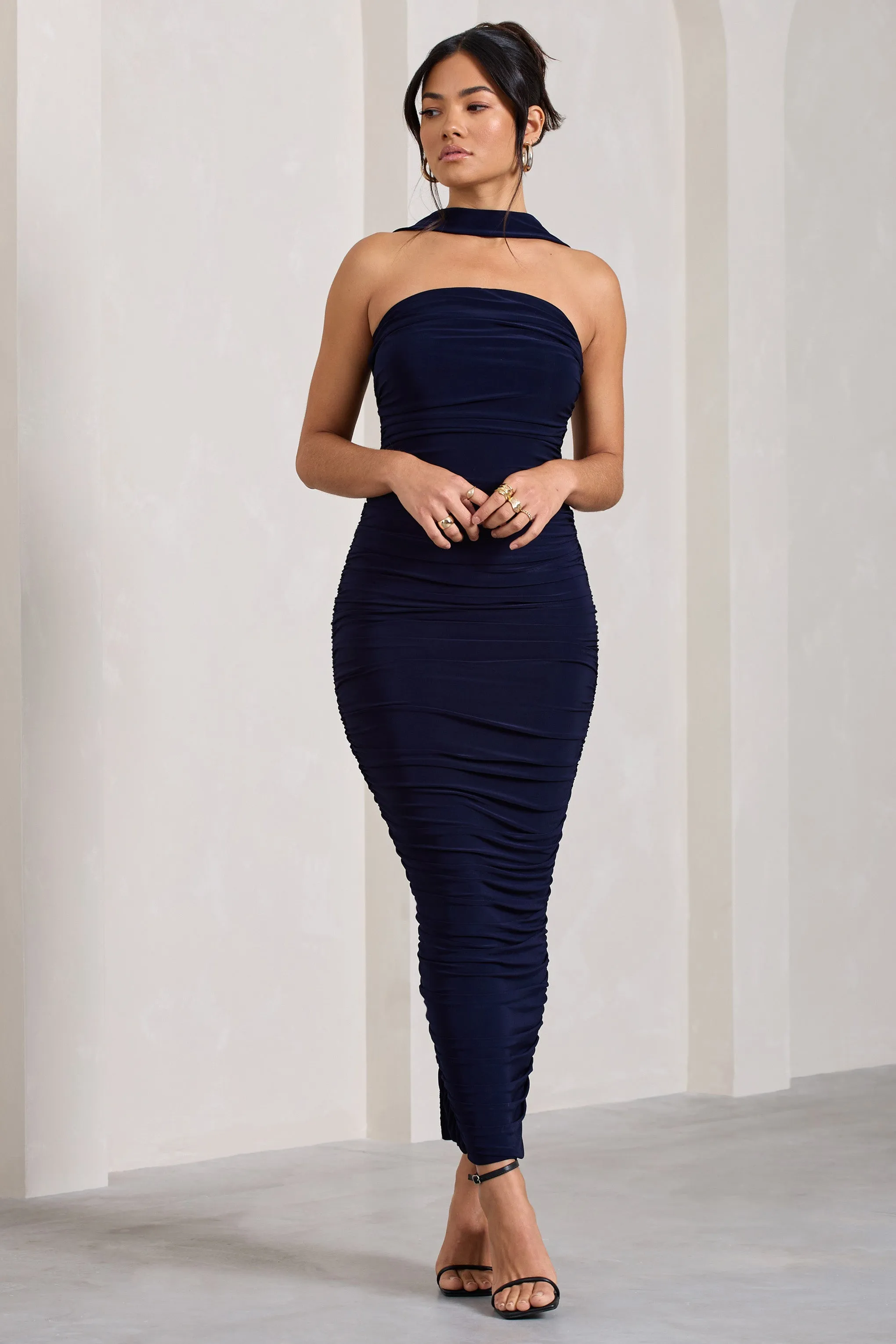 Entranced | Navy Ruched Bandeau Maxi Dress With Halter Collar sold by Club L London