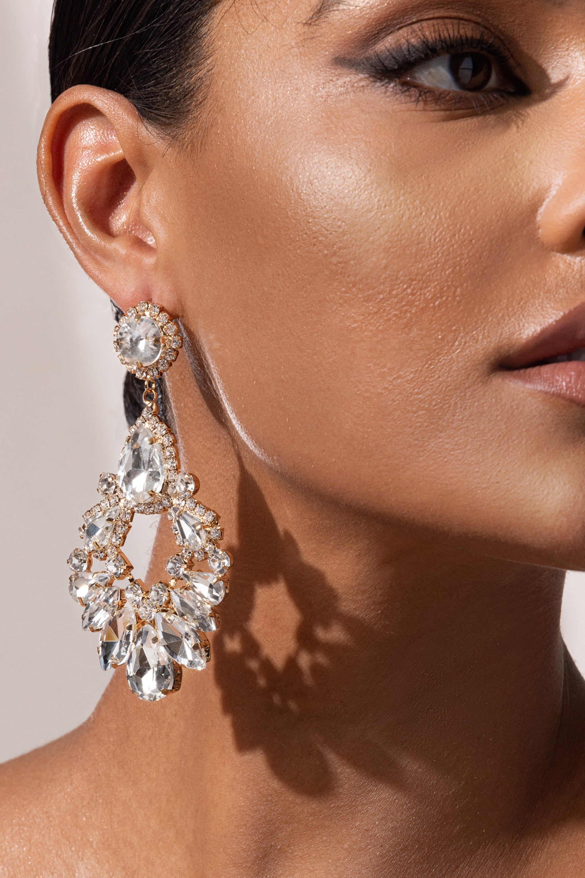 Ginevra | Gold Crystal Chandelier Drop Earrings sold by Club L London product image thumbnail 2