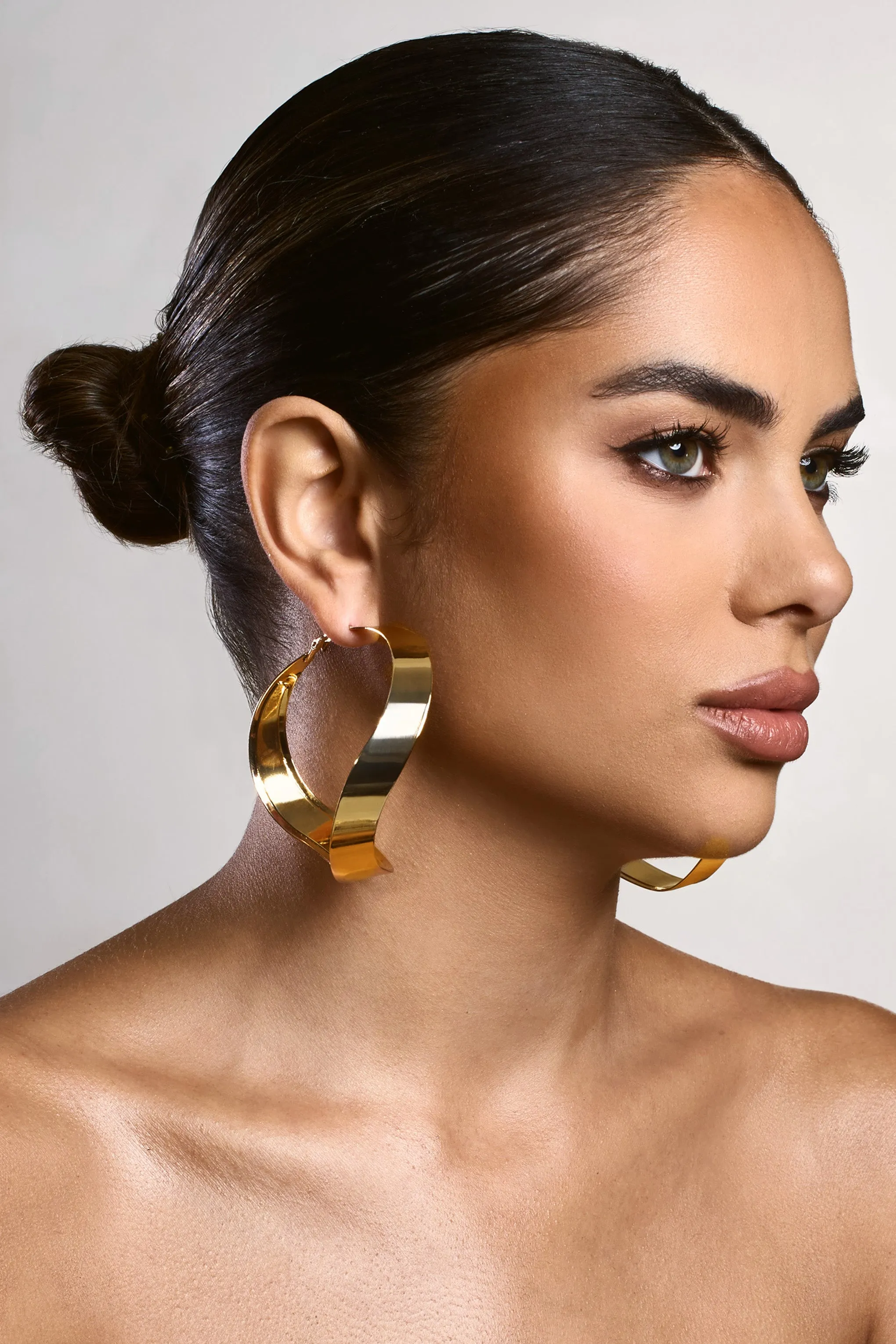 Abrielle | Gold Textured Hoop Earrings sold by Club L London