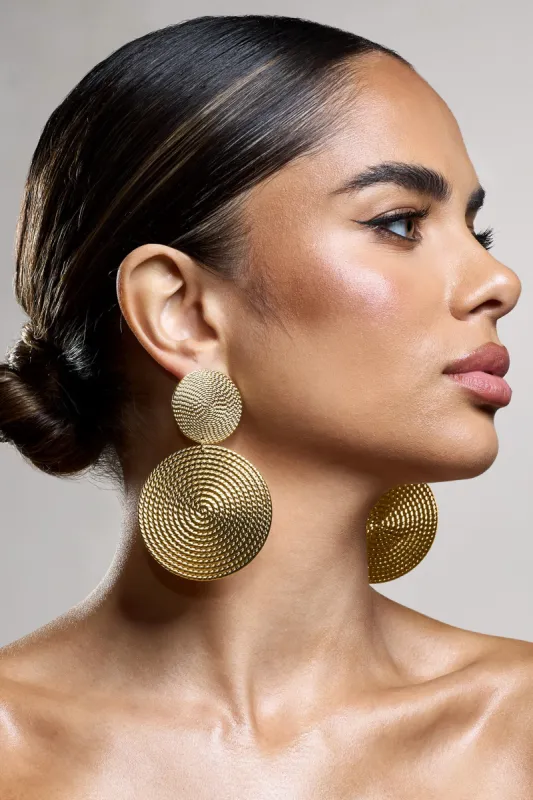Tranquil | Gold Textured Disc Drop Earrings sold by Club L London
