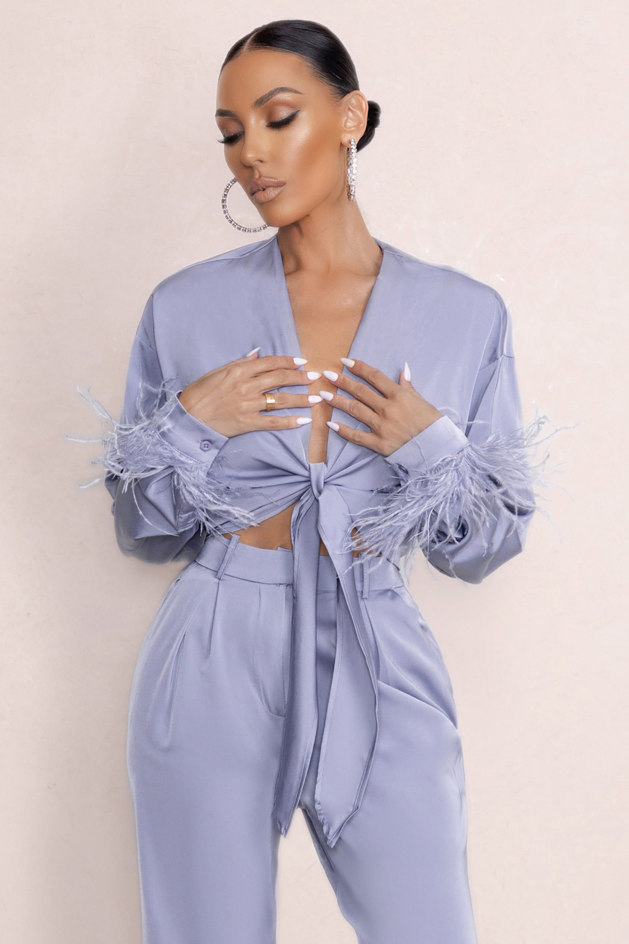 Beauty Pie | Powder Blue Plunge Neck Tie Front Shirt With Feather Trim sold by Club L London