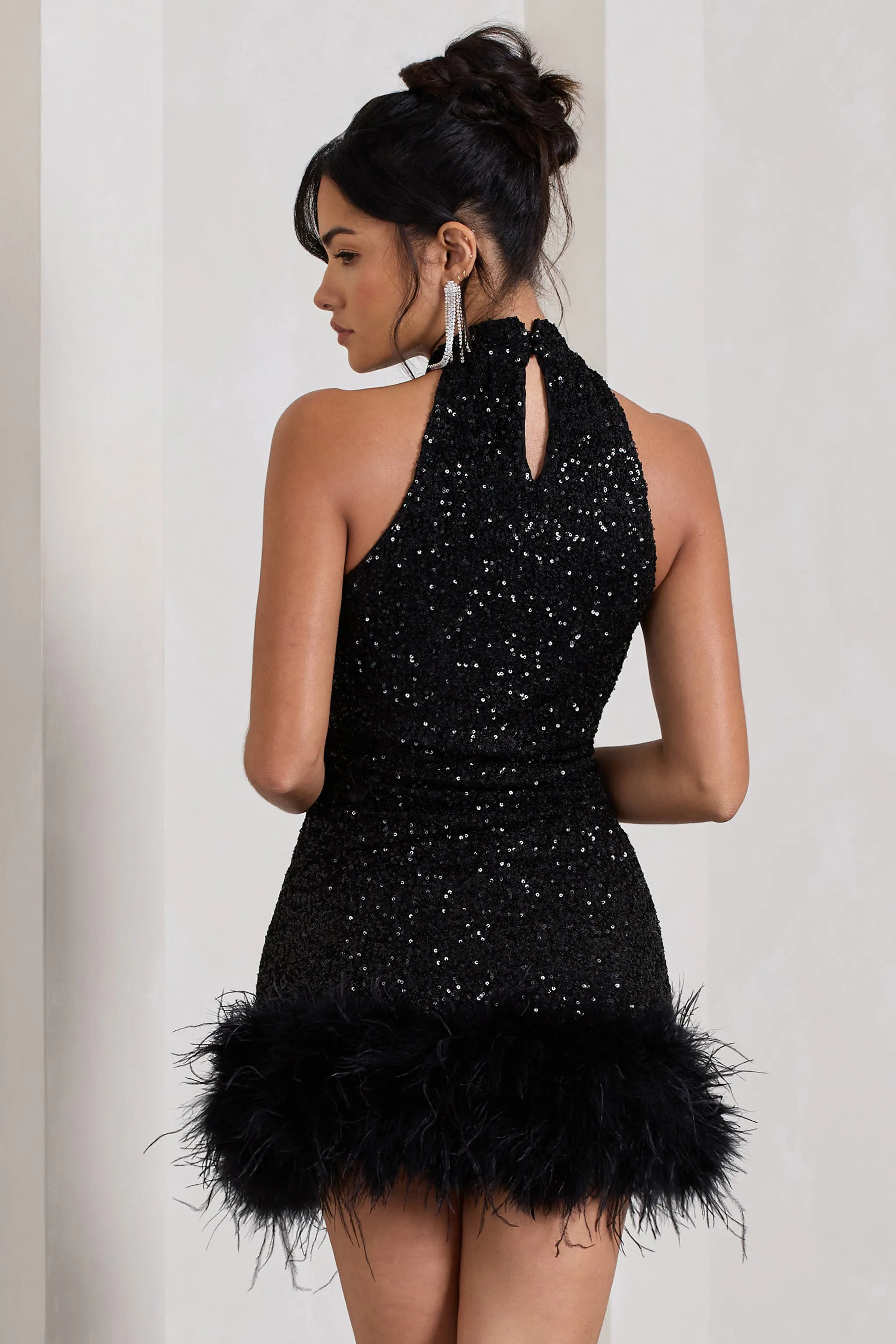 Tillie | Black Sequin High Neck Trapeze Mini Dress With Feather Hem Detail sold by Club L London product image thumbnail 2