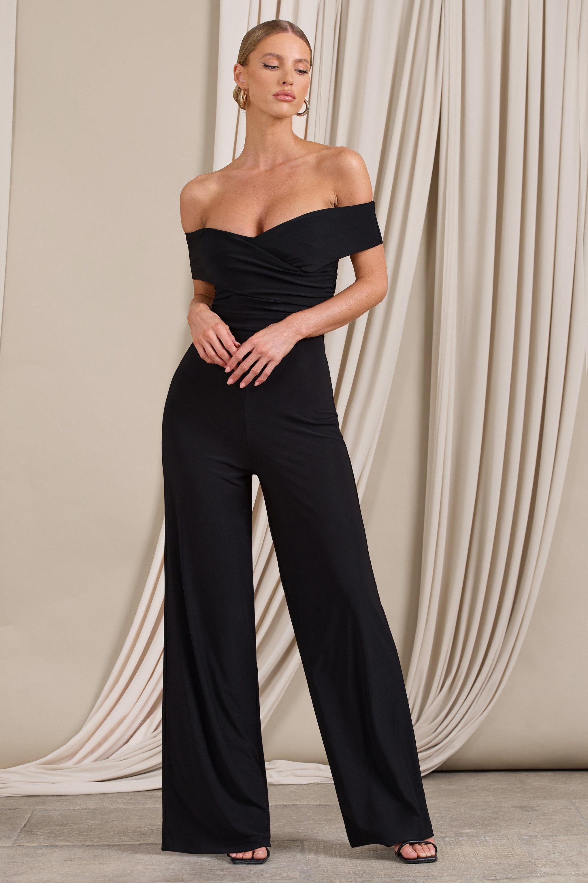 Recognition | Black Off The Shoulder Ruched Jumpsuit sold by Club L London