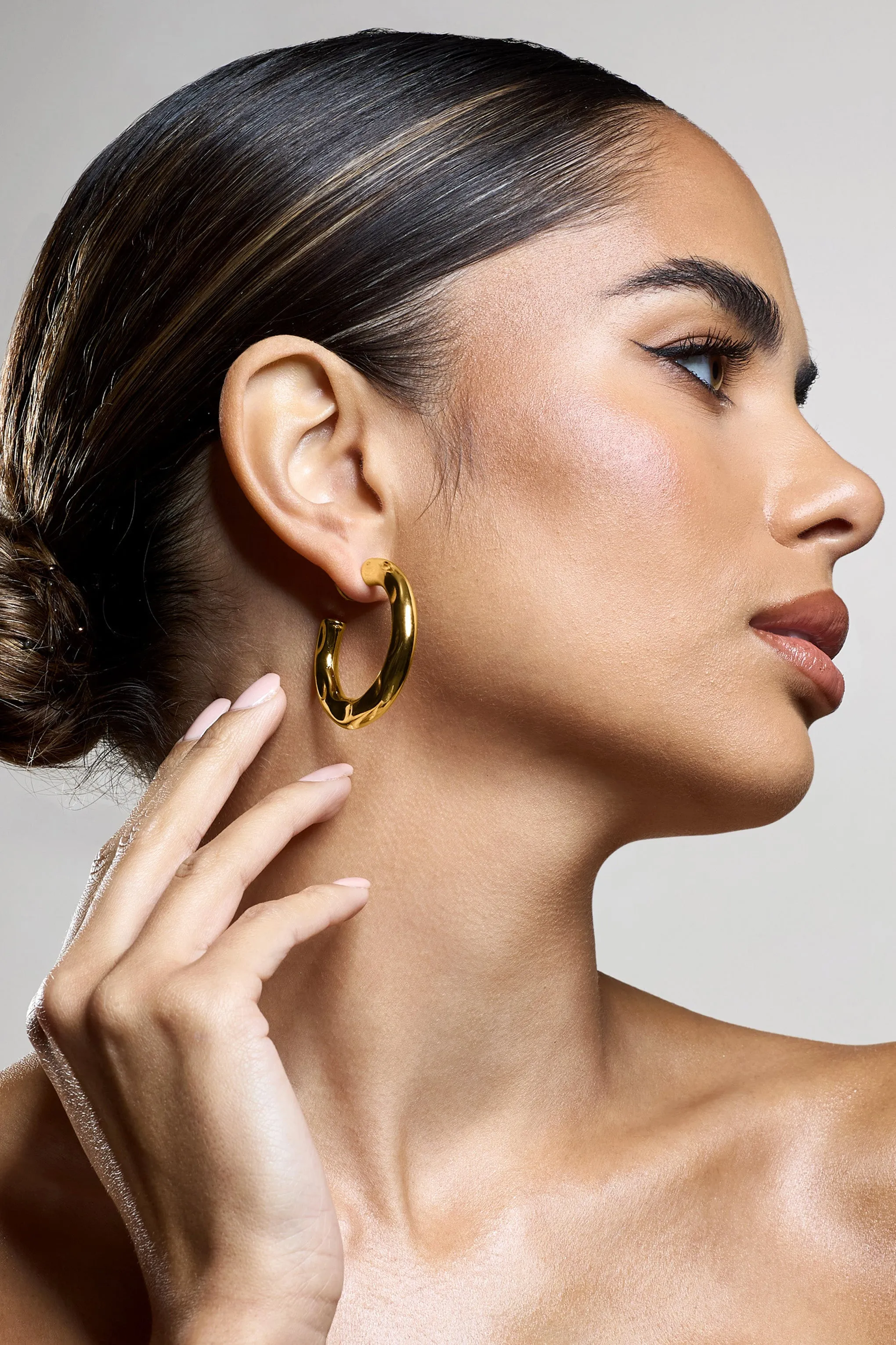 Lanco | Gold Hoop Earrings sold by Club L London