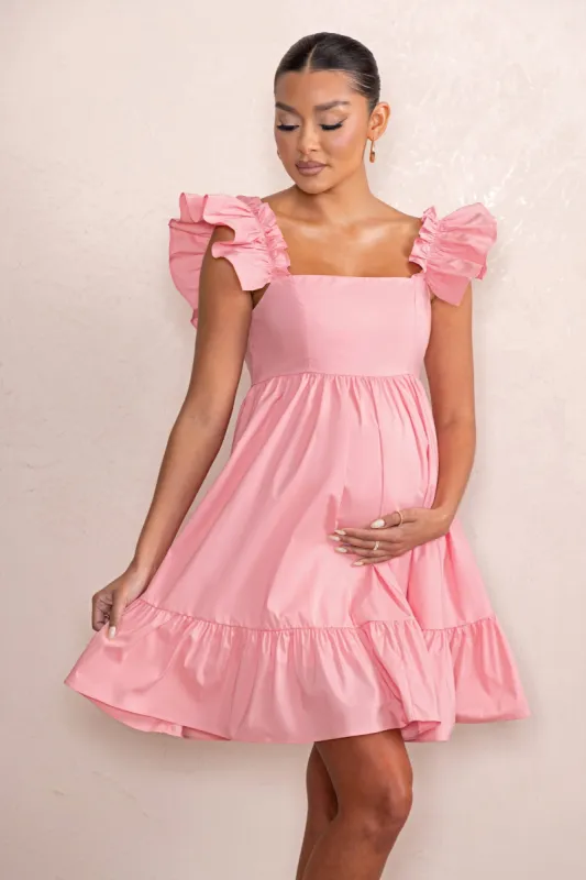 Dolly Daze | Blush Ruffle Sleeve Babydoll Maternity Mini Dress sold by Club L London
