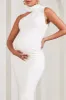 Sylvia | White Ruched Asymmetric Maternity Maxi Dress With Wrap-Collar sold by Club L London