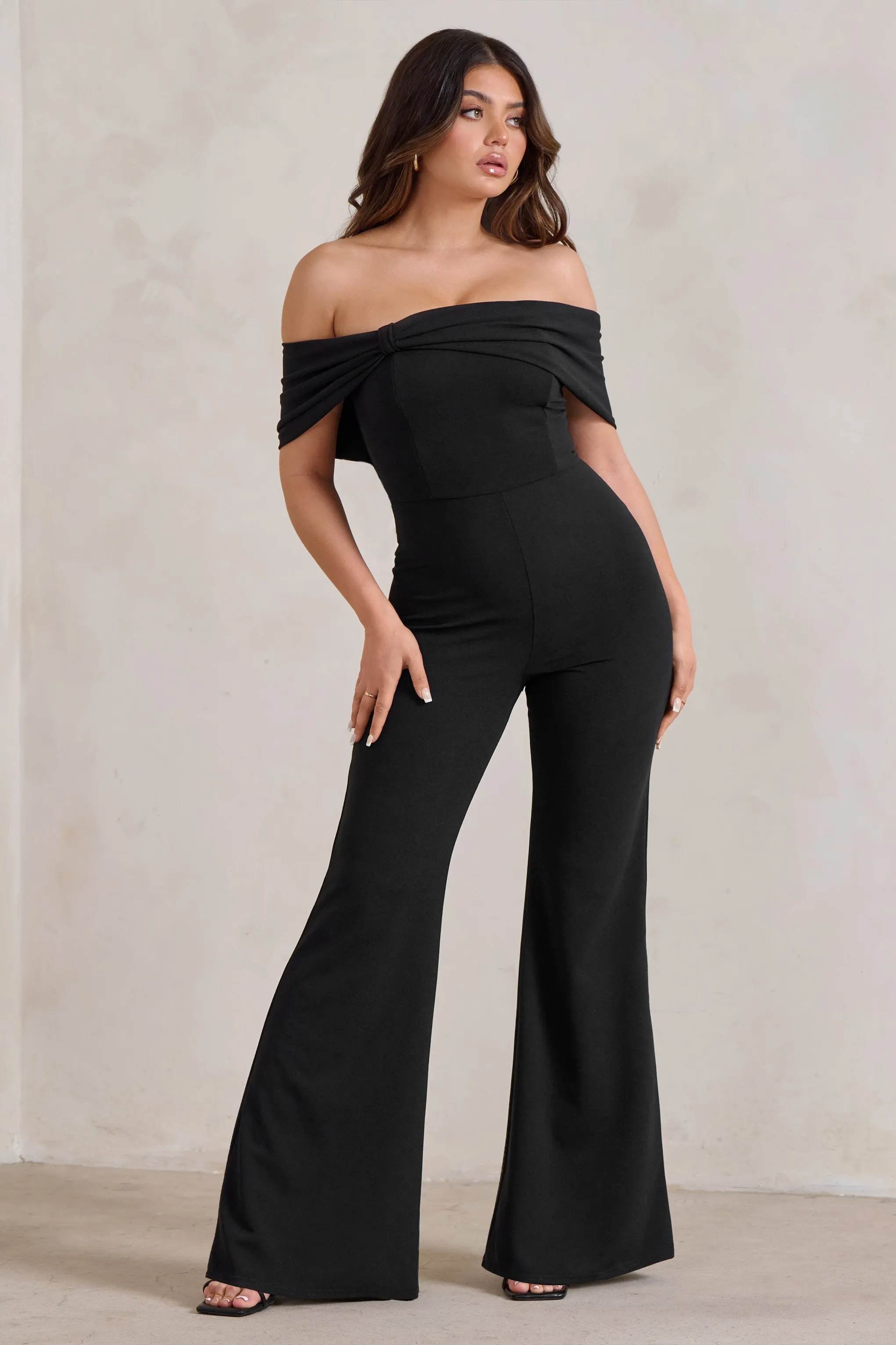 Zoey | Black Bardot Bow Detail Jumpsuit sold by Club L London