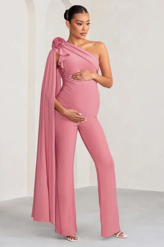 Nova | Blush Pink Maternity One Shoulder Cape Jumpsuit with Flower Detail sold by Club L London
