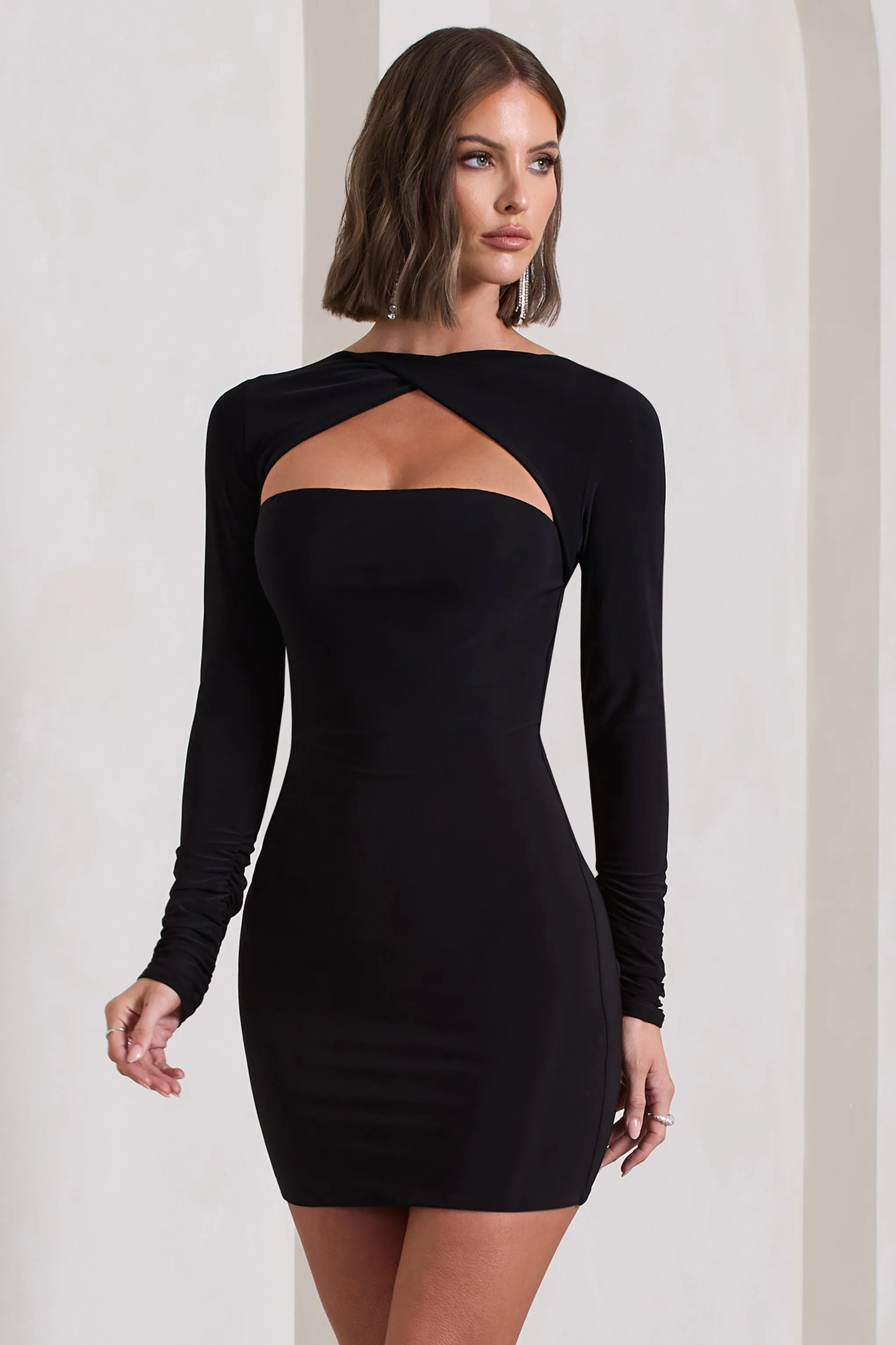 Charmer | Black Twist-Neck Cut-Out Mini Dress sold by Club L London