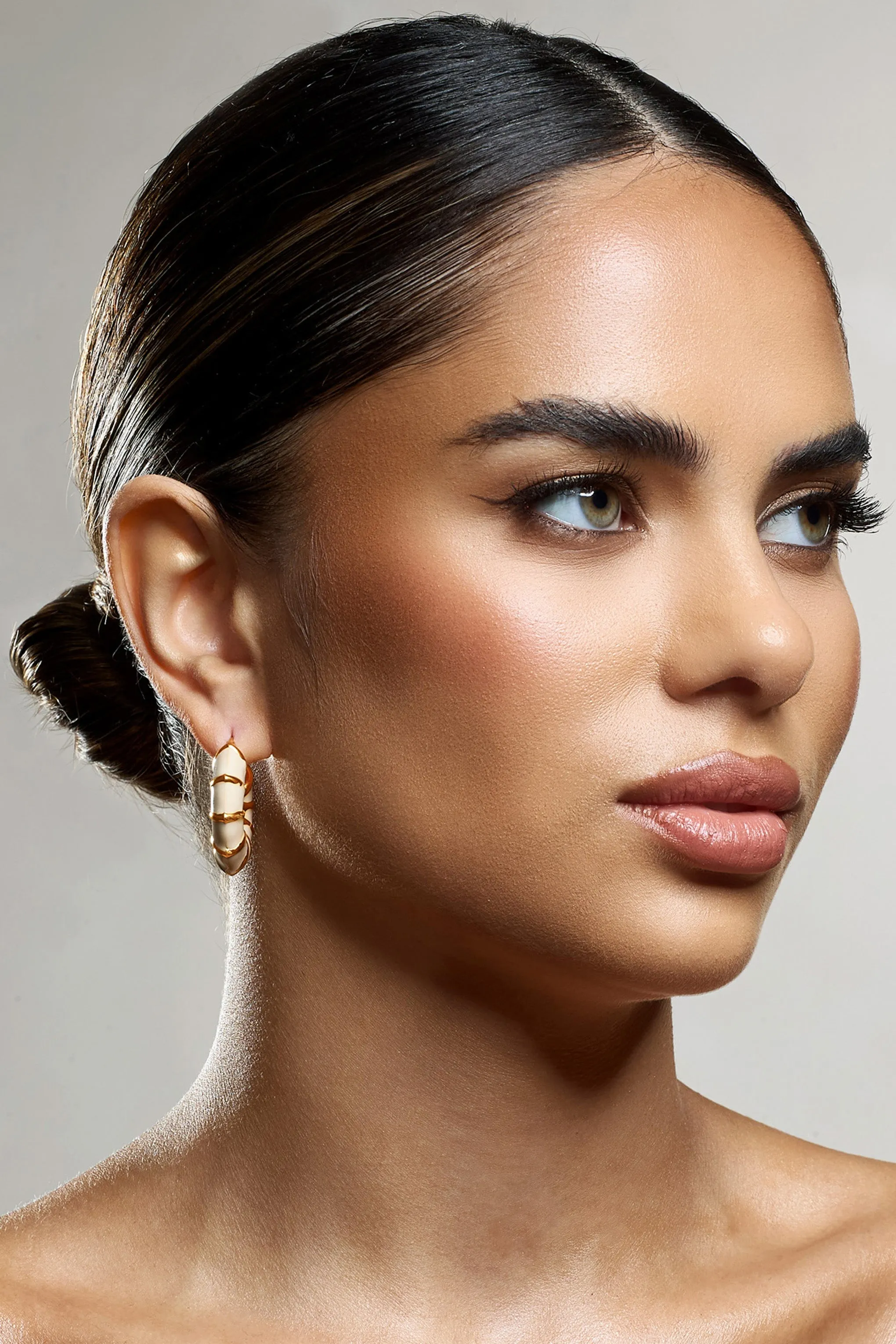 Edie | Nude & Gold Hoop Earrings sold by Club L London