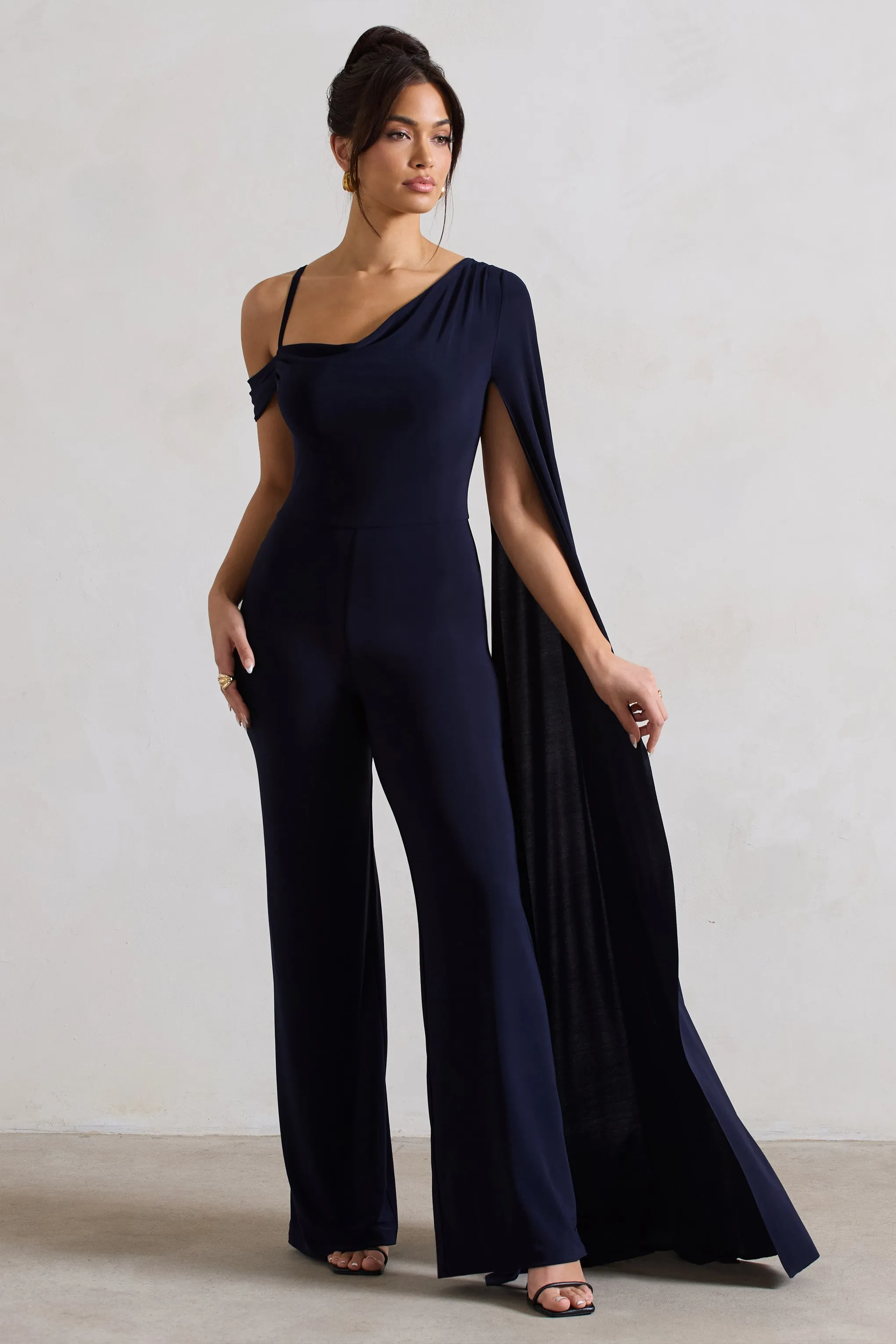 Jelena | Navy Asymmetric Draped Straight-Leg Jumpsuit With Cape Sleeve sold by Club L London