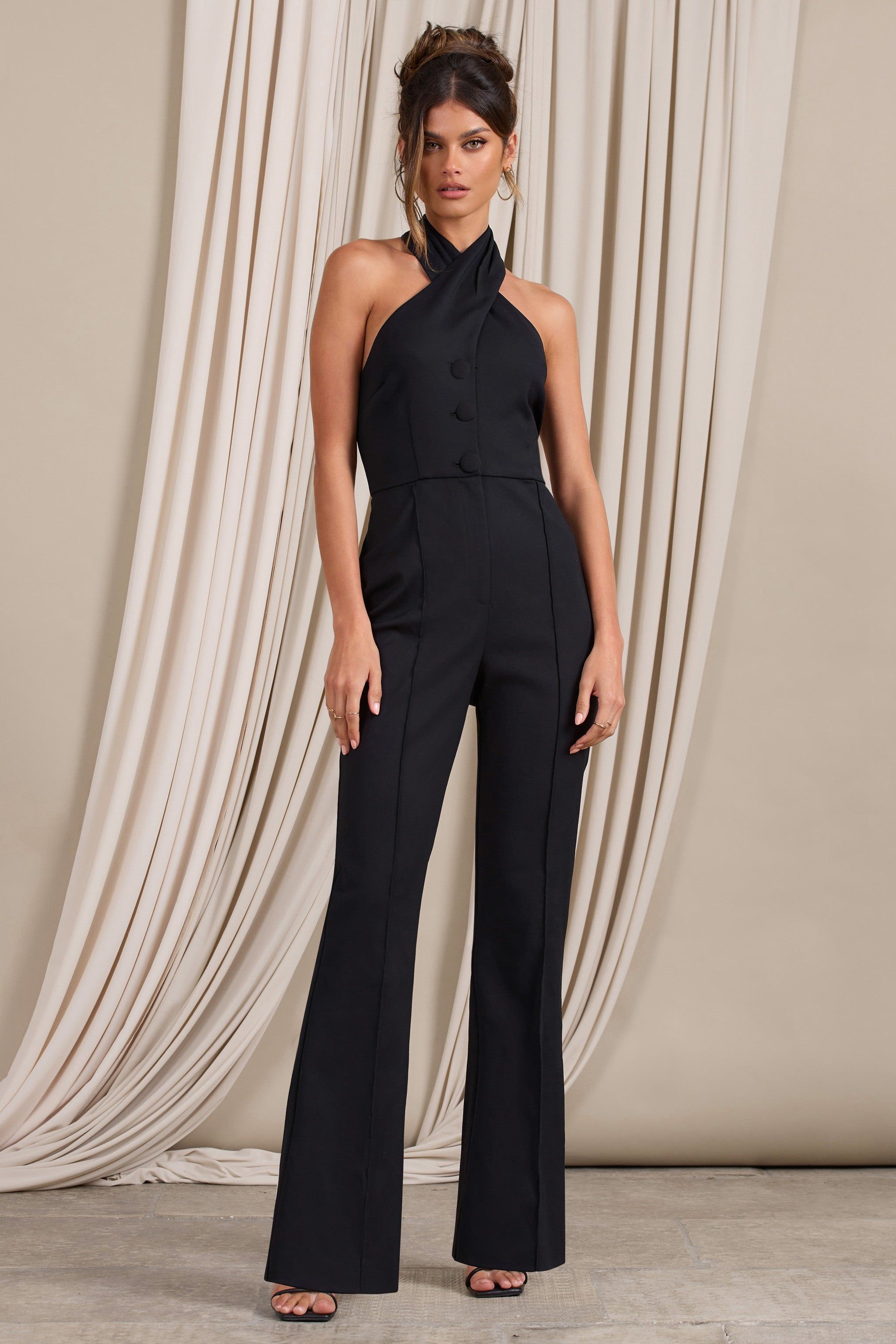 Don't Cross Me | Black Halter Neck Tailored Buttoned Sleeveless Jumpsuit sold by Club L London