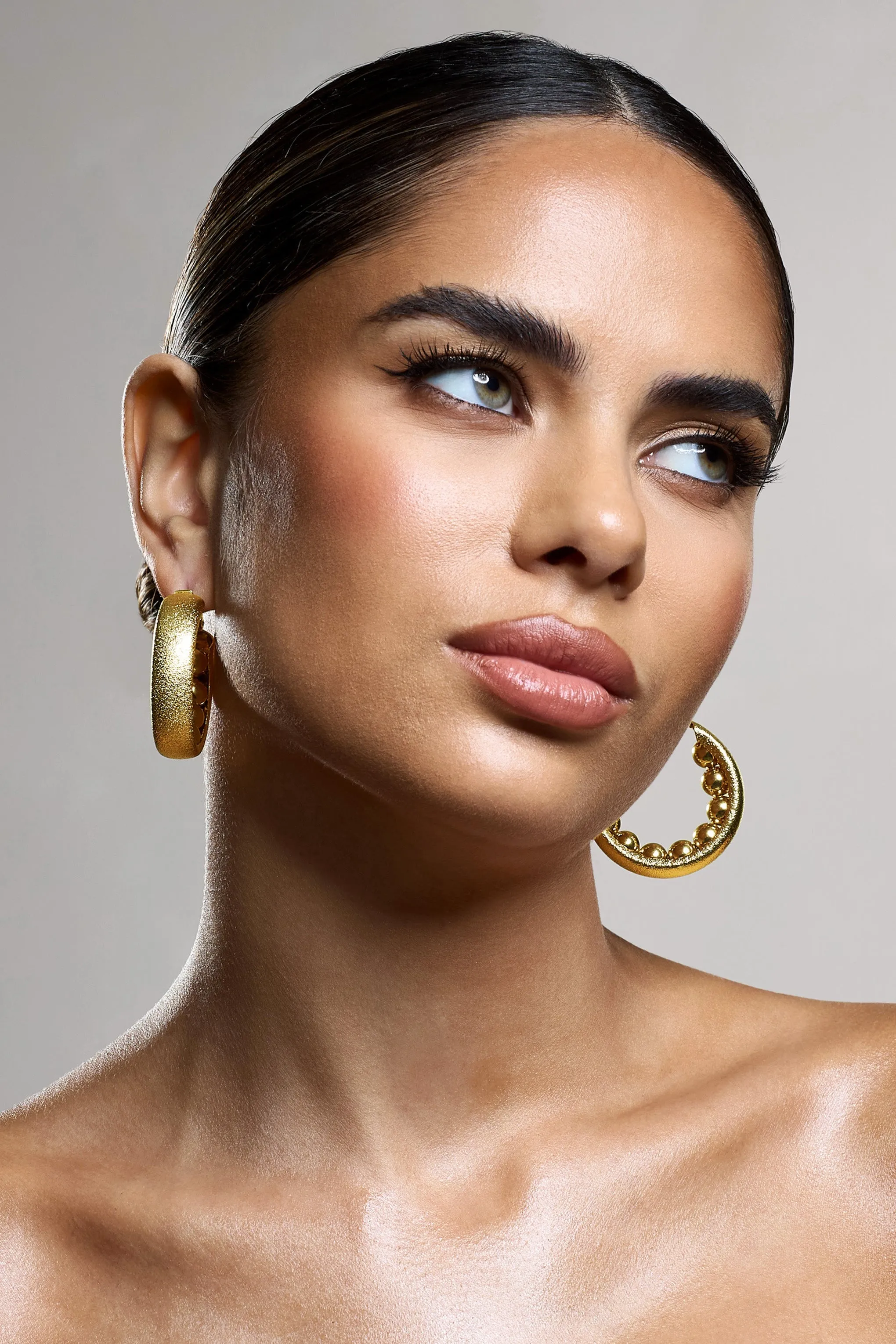 Portal | Gold Textured Chunky Hoop Earrings sold by Club L London product image thumbnail 4