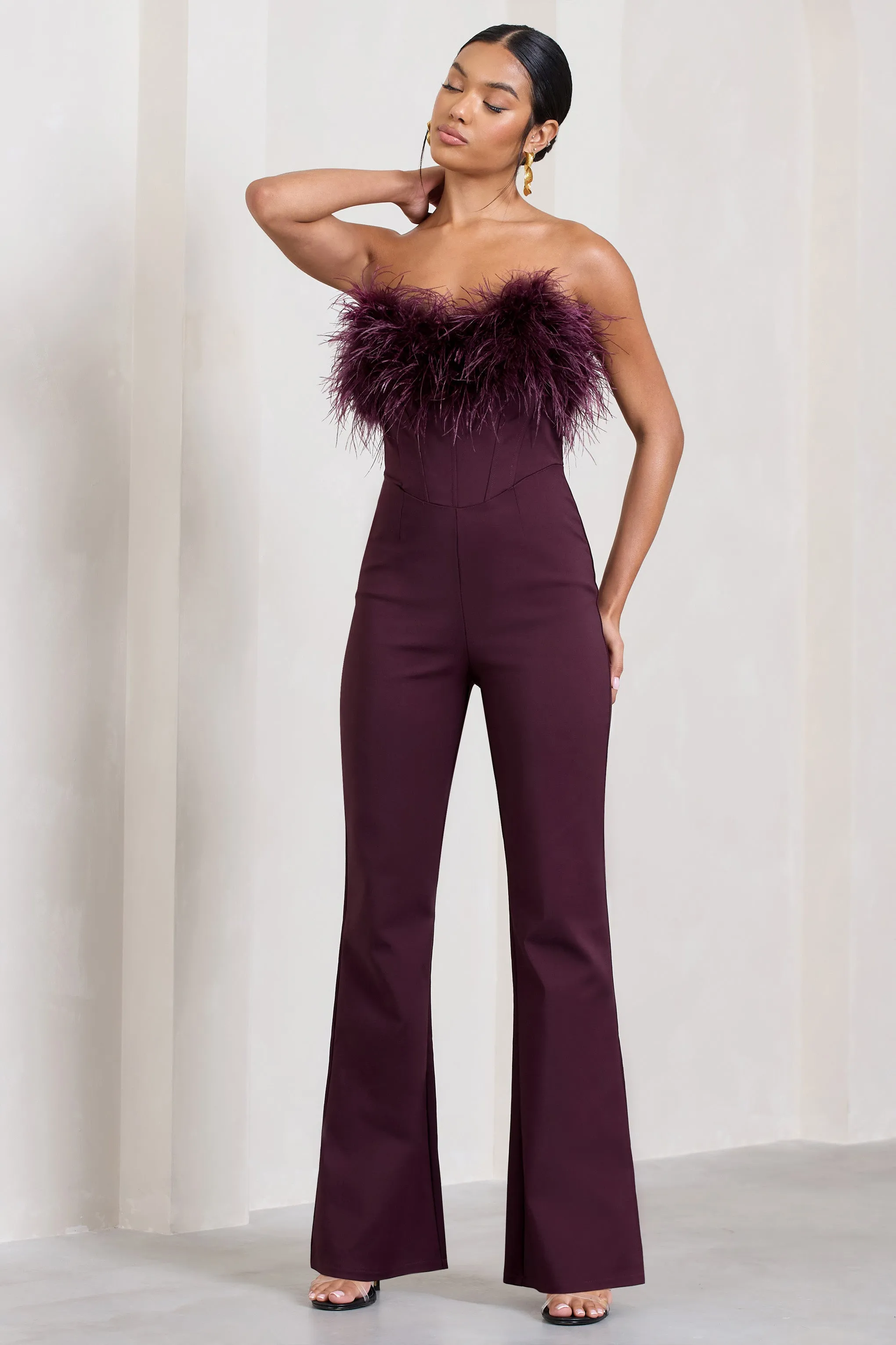 Tessa | Burgundy Shaped Neckline Corset Jumpsuit With Feather Trim Detail sold by Club L London product image thumbnail 2