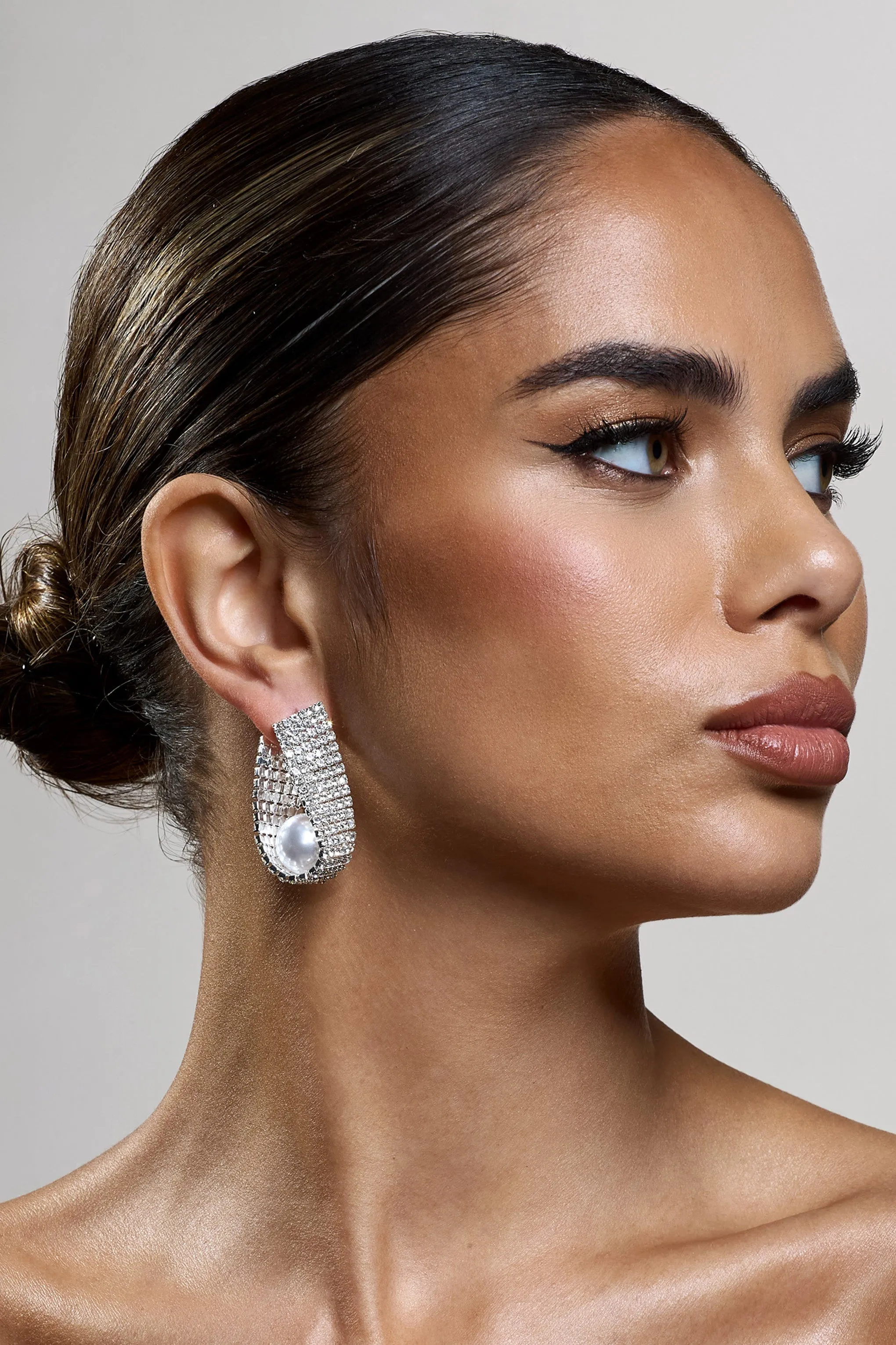 Lumen | Silver Diamante Pearl Statement Earrings sold by Club L London