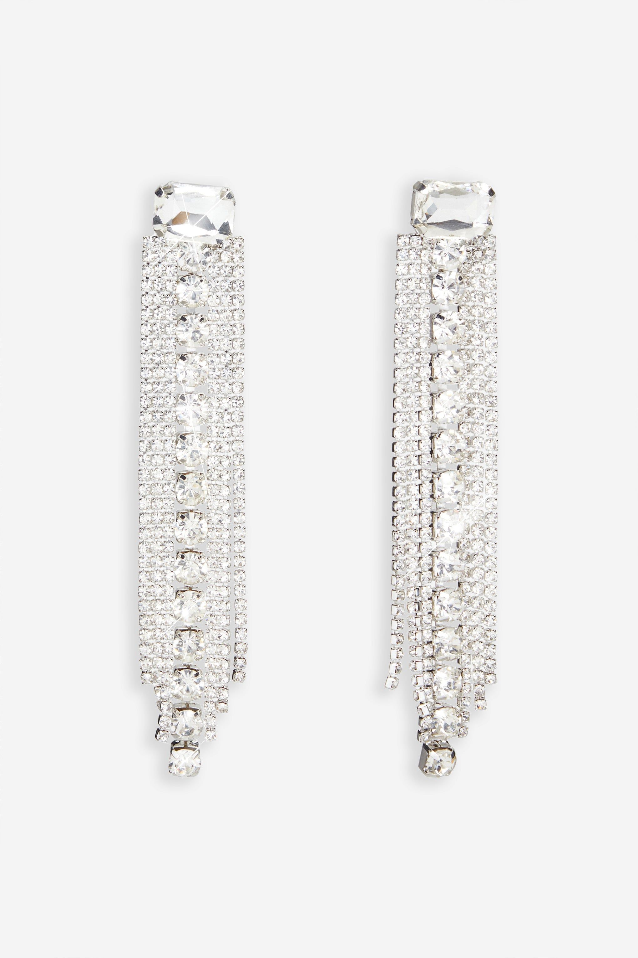 Ali | Silver Diamante Tassel Earrings sold by Club L London