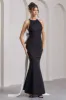 Bestow | Black Open-Back Maxi Dress With Oversized White Bow sold by Club L London