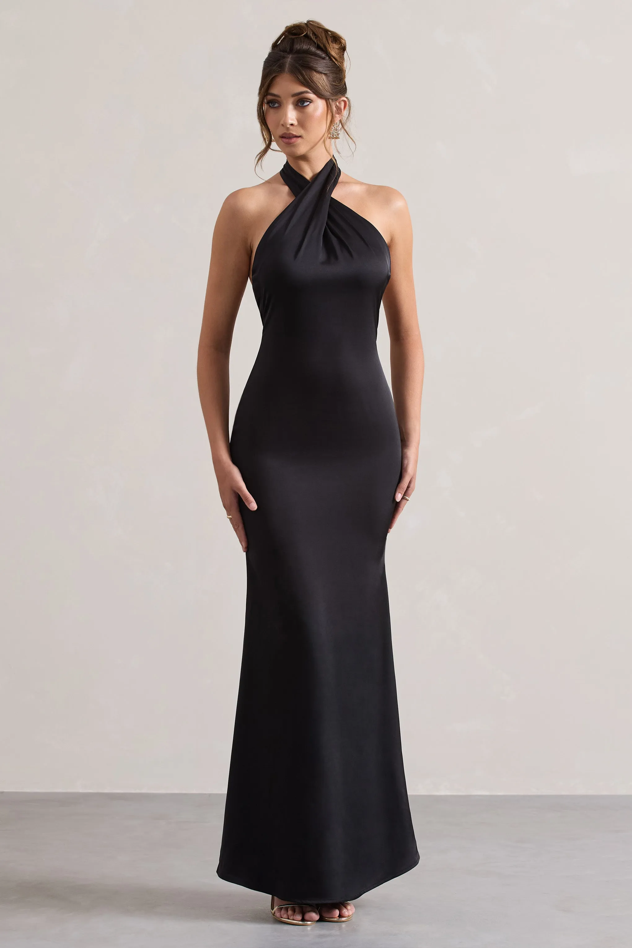 Unbeatable | Black Satin Cross Over Halter-Neck Maxi Dress sold by Club L London