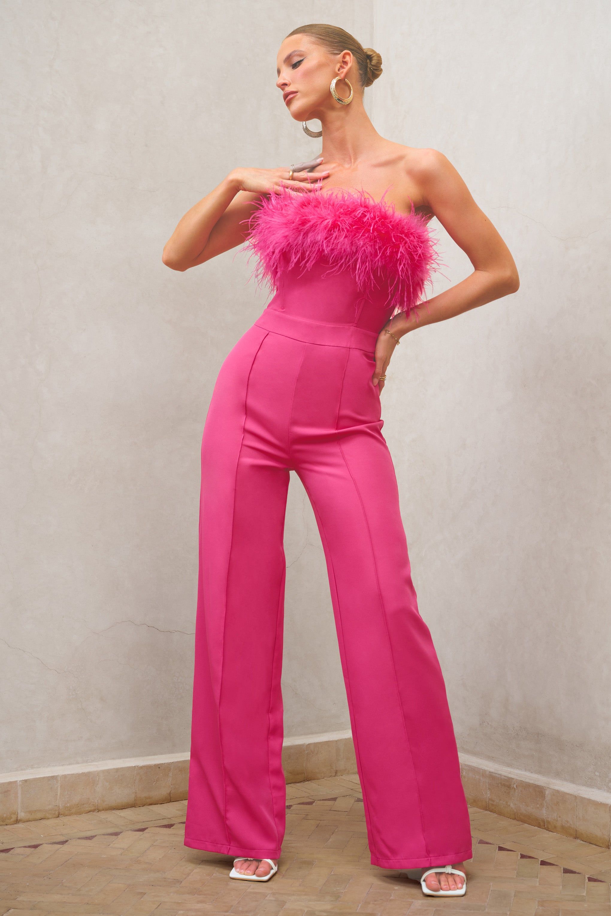 First Class | Hot Pink Bandeau Feather Wide Leg Jumpsuit sold by Club L London