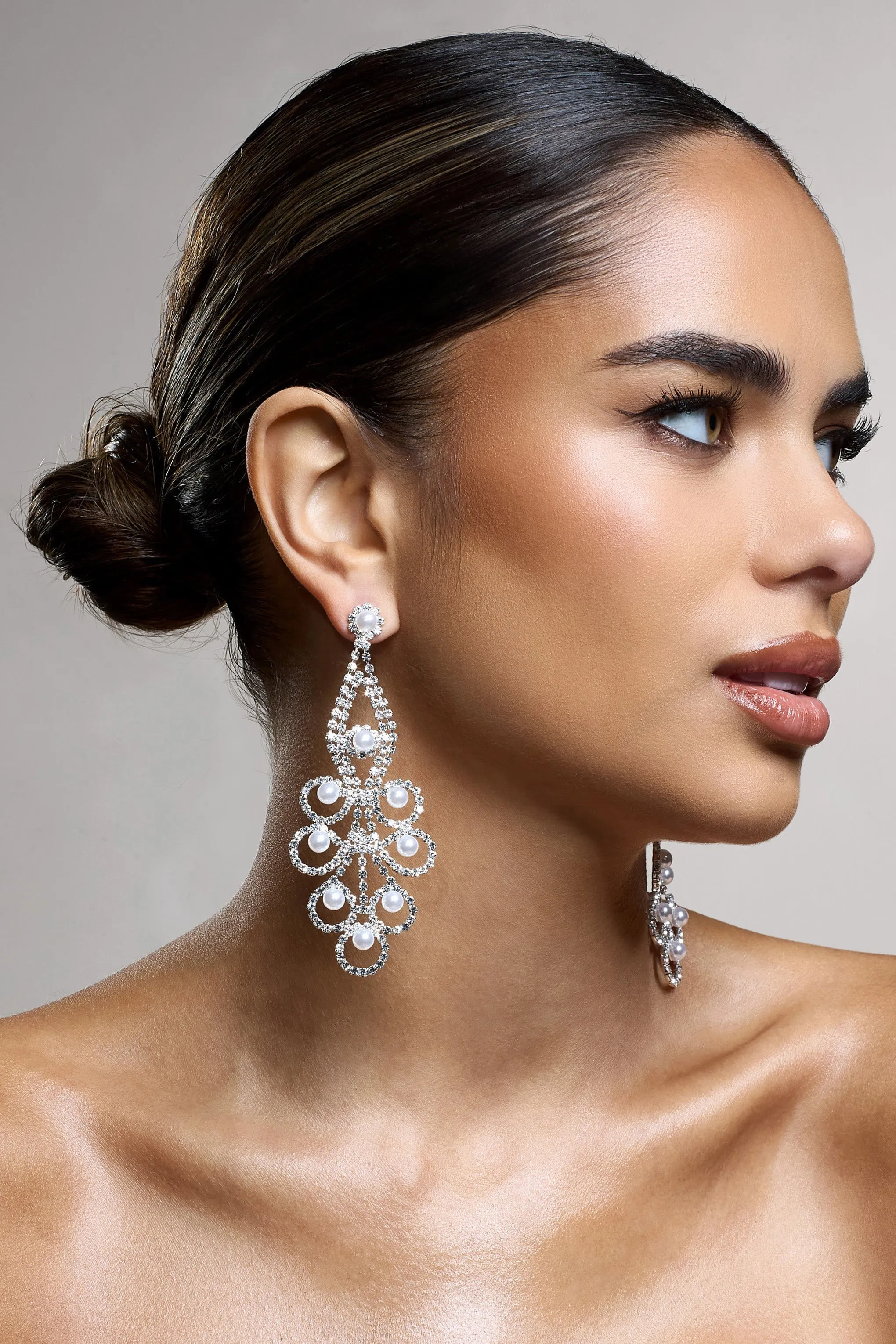 Chandelier | Silver Diamante Pearl Statement Earrings sold by Club L London