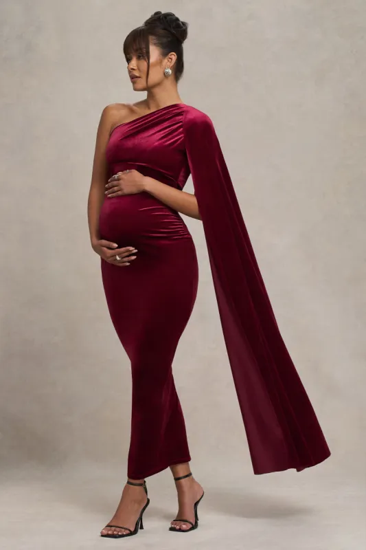 Amaryllis | Berry Velvet Maternity One Shoulder Maxi Dress with Cape Sleeve sold by Club L London