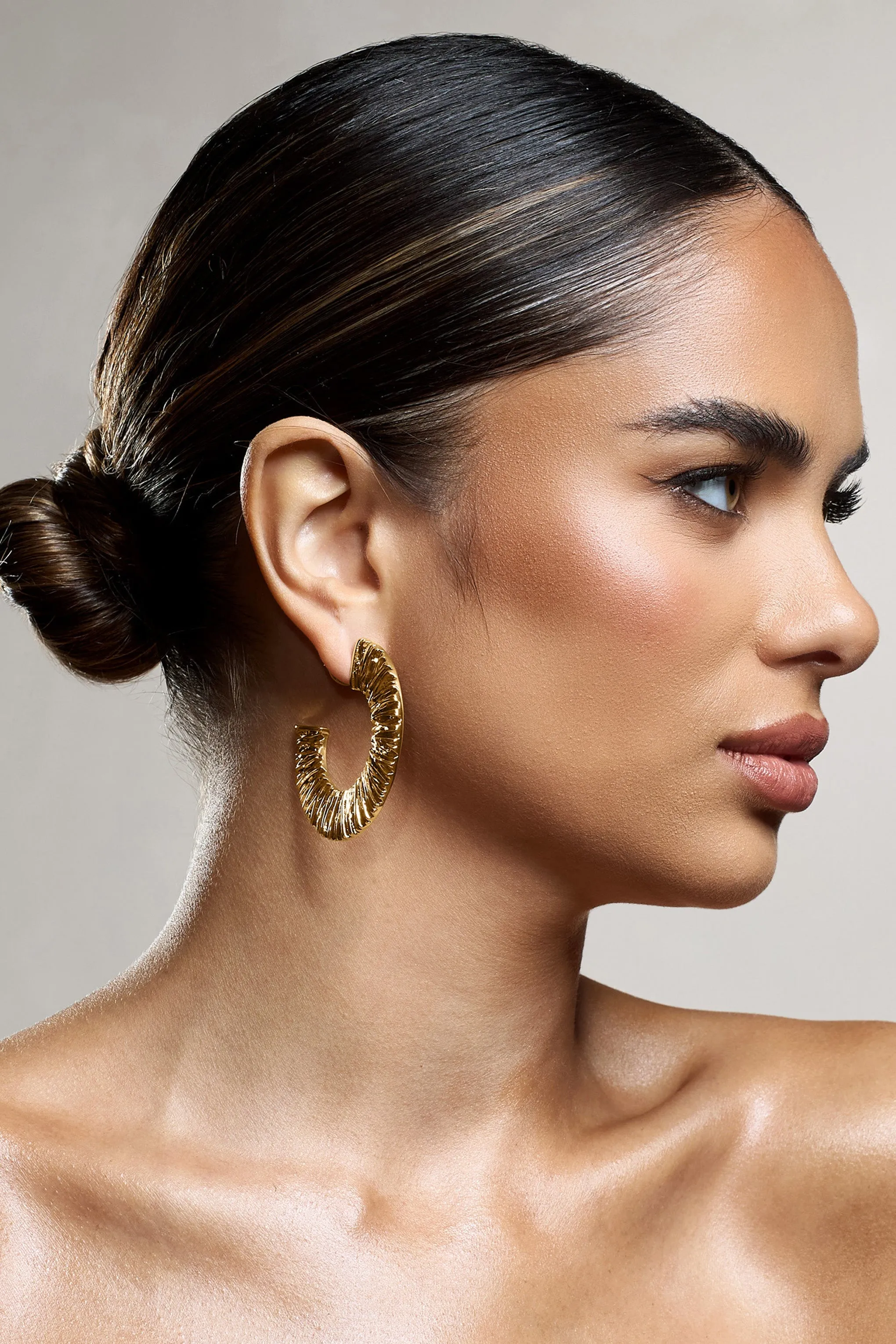 Gamora | Gold Textured Chunky Hoops sold by Club L London