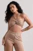 Chasing Dawn | Gold Metallic Twist Halter-Neck Crop Top sold by Club L London