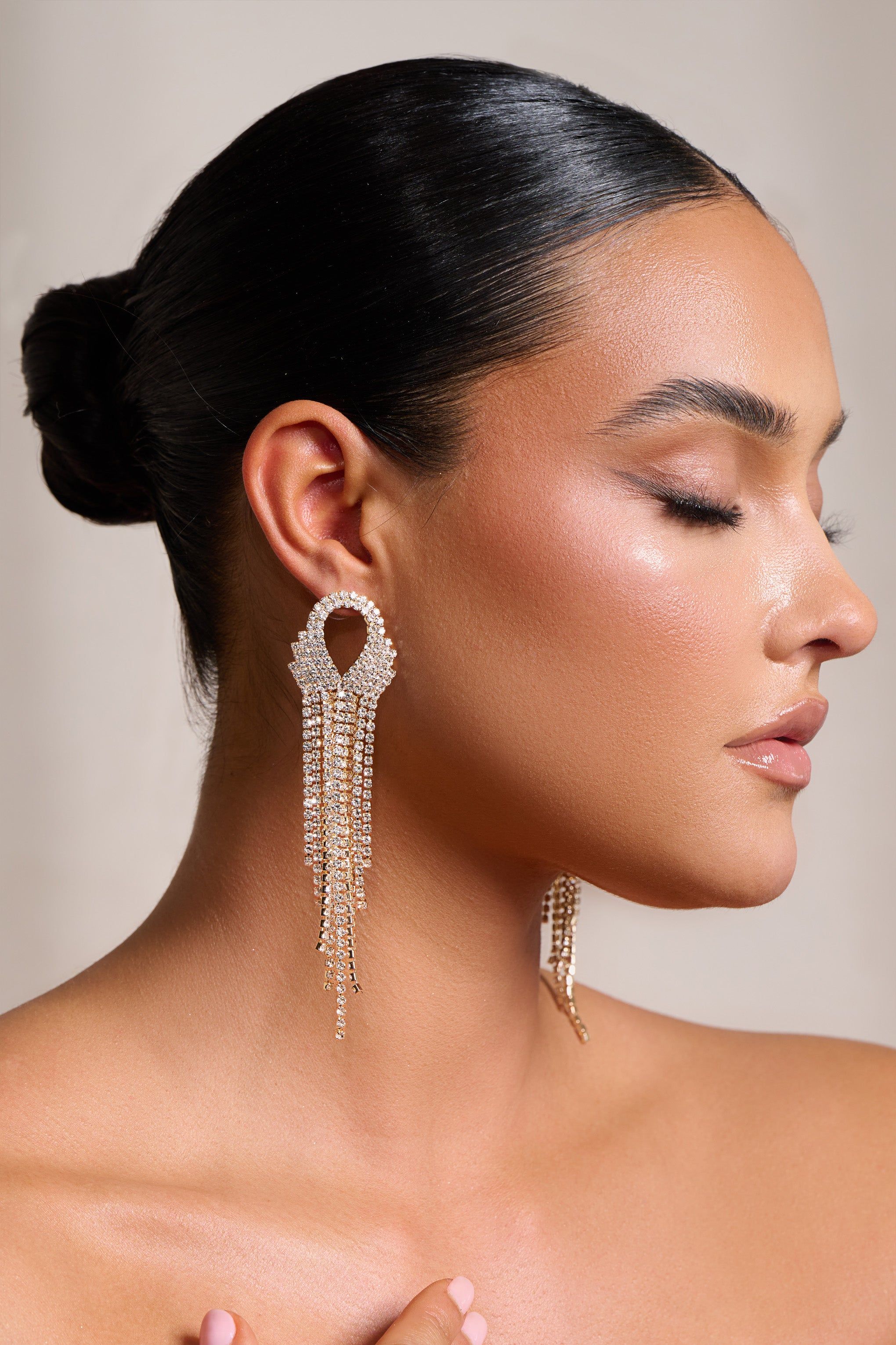 Stephanie | Gold Diamante Chain Drop Earrings sold by Club L London