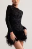 Claudia | Black Sequin High Neck Feather Hem Mini Dress With Long Sleeves sold by Club L London
