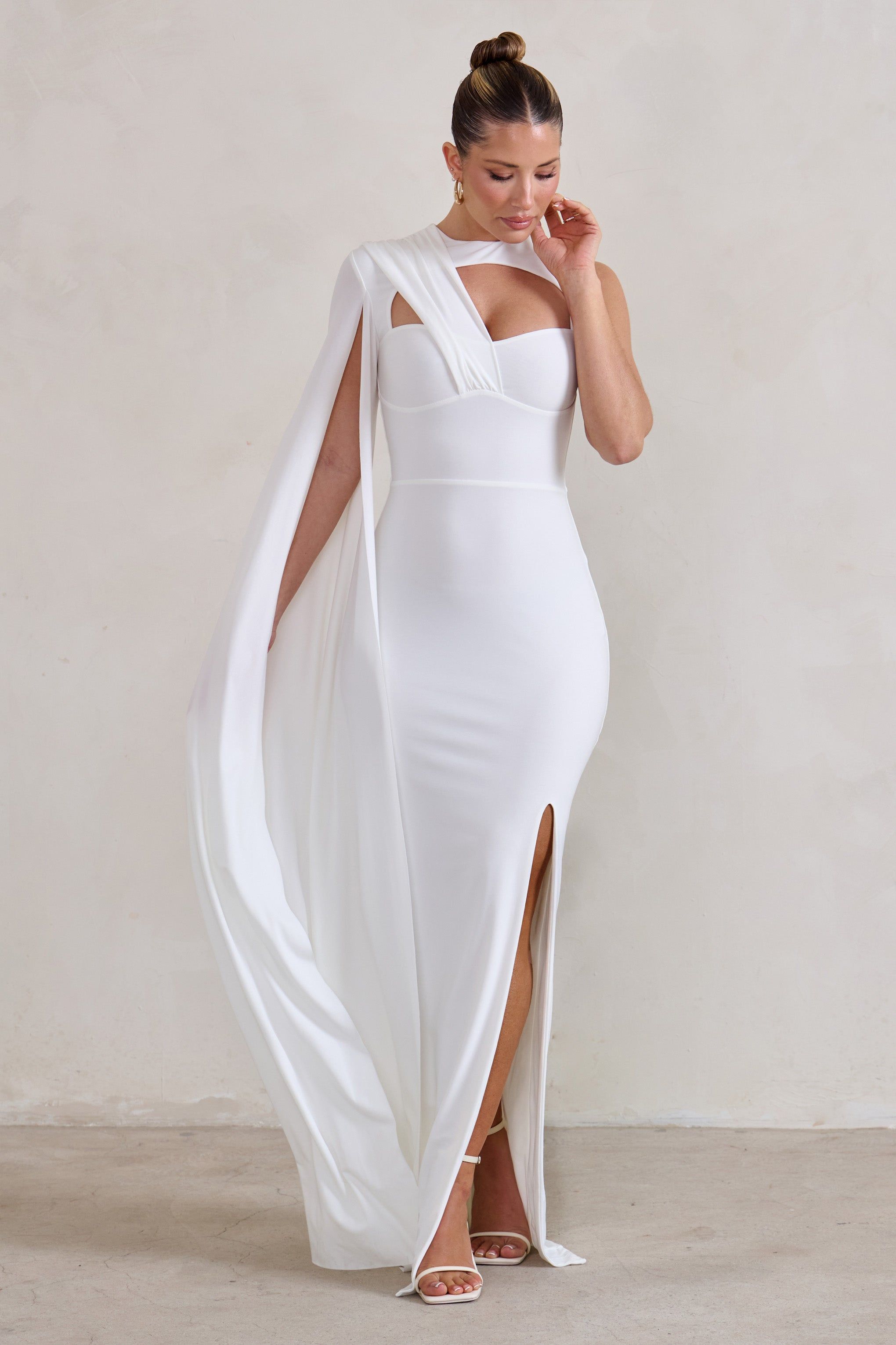 Emmey | White Asymmetric Cut Out Maxi Dress With Statement Cape sold by Club L London