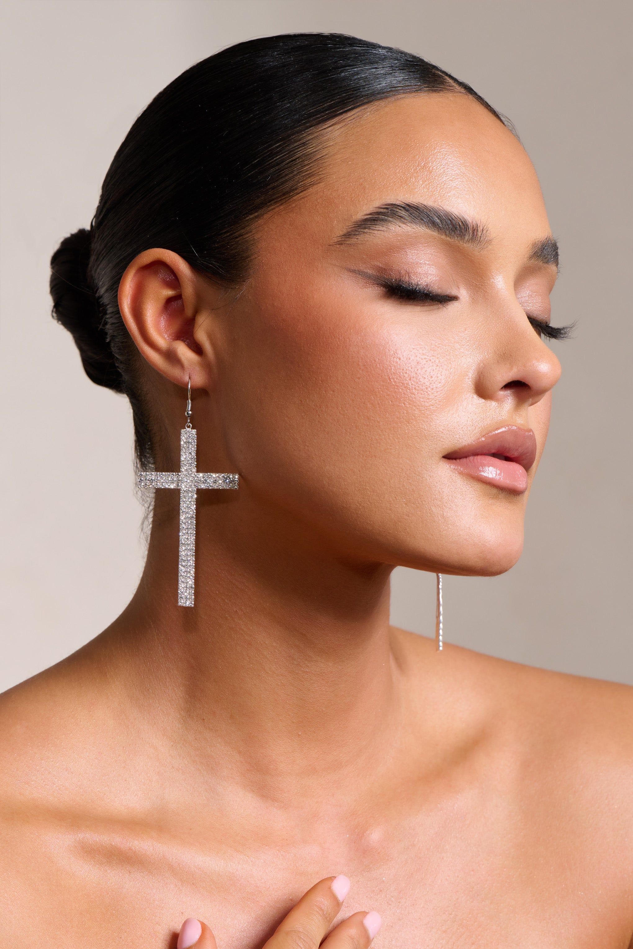 Storm | Silver Diamante Cross Earrings sold by Club L London