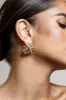 In Secret | Gold Diamante Abstract Statement Earrings sold by Club L London