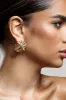 In Secret | Gold Diamante Abstract Statement Earrings sold by Club L London