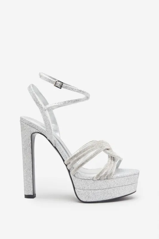 Doll Drama | Silver Glitter Diamante Strappy Platform Heels sold by Club L London