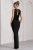 Night To Remember | Black Open-Back Split Maxi Dress sold by Club L London