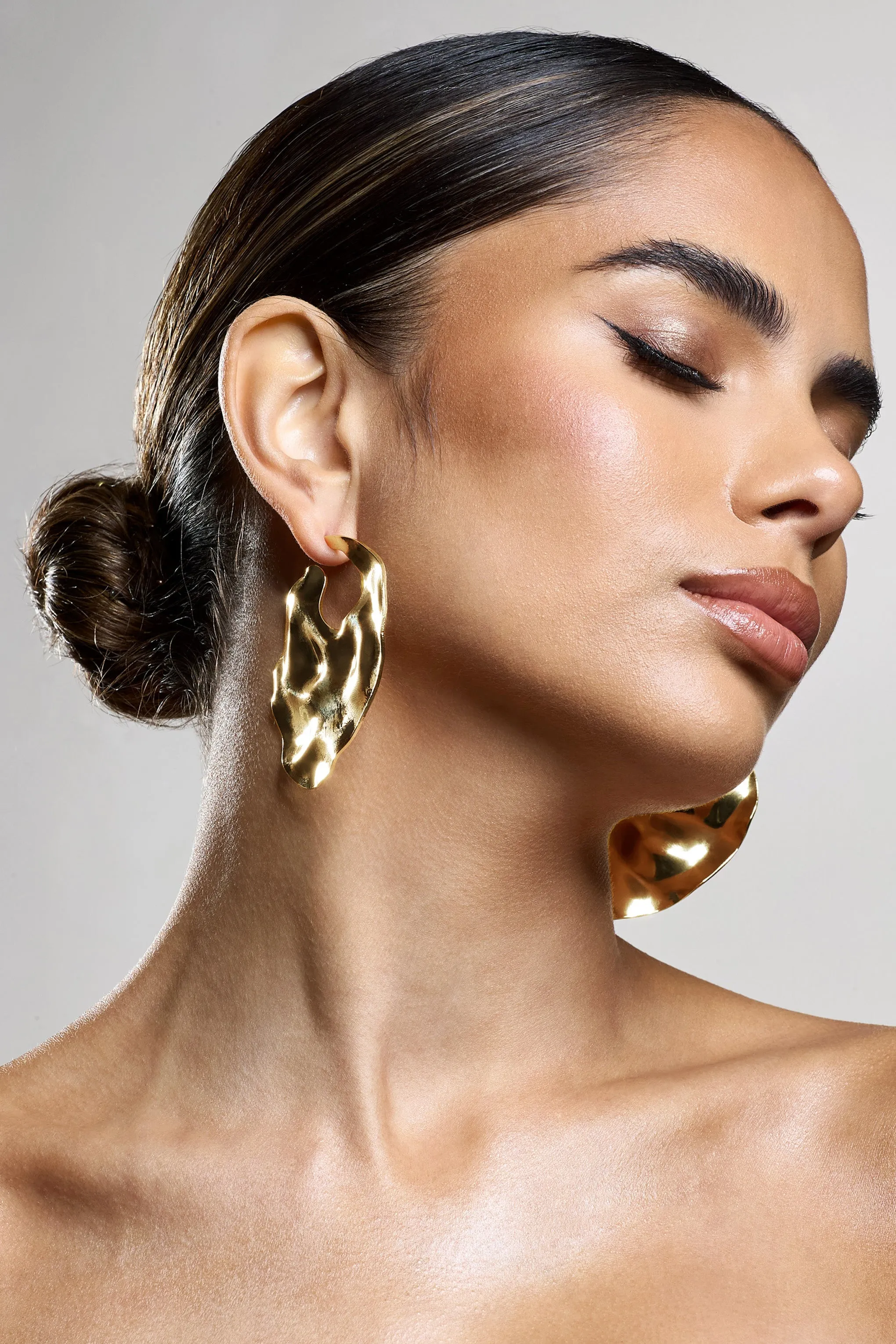 Journey | Gold Textured Abstract Disc Earrings sold by Club L London product image thumbnail 3