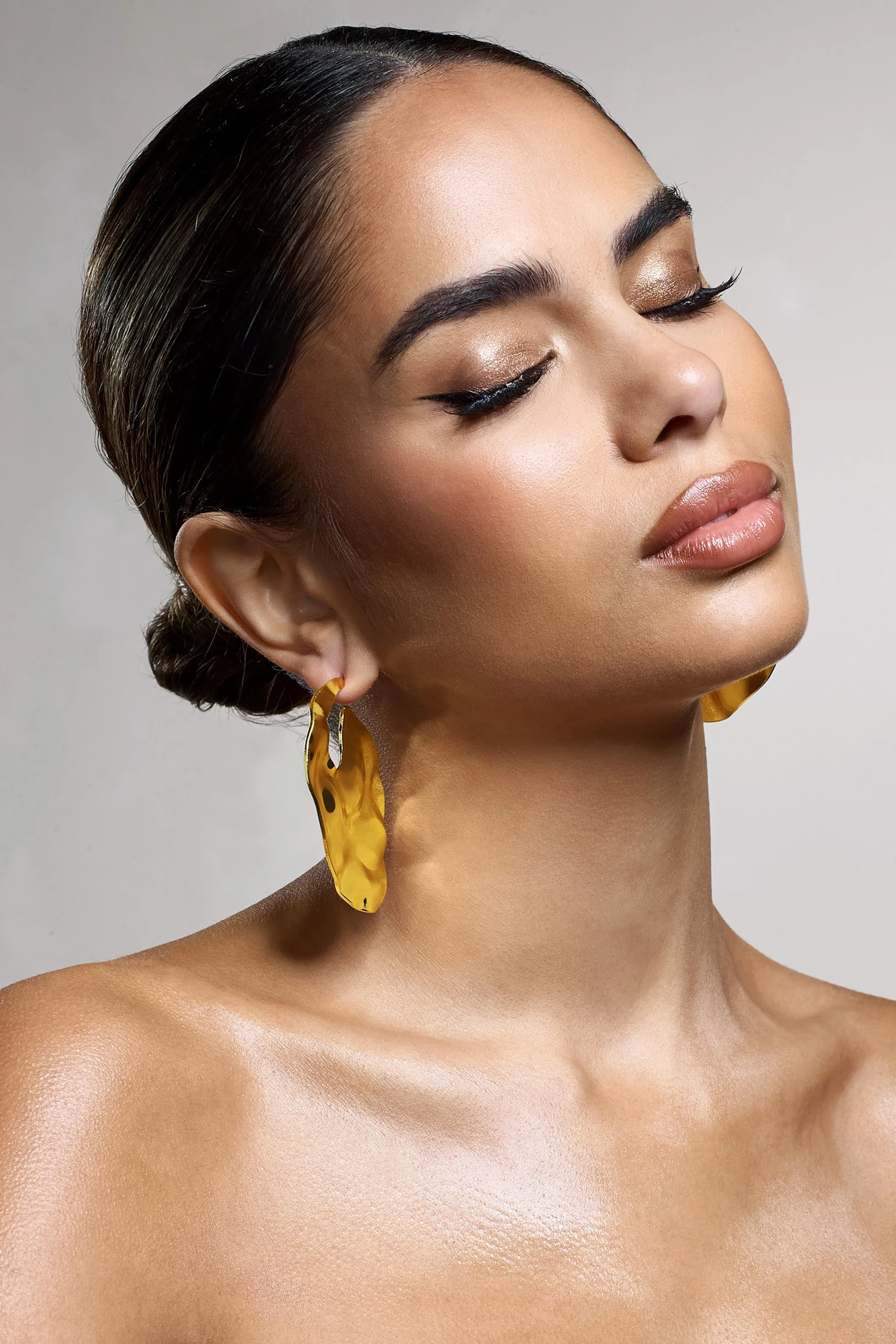 Journey | Gold Textured Abstract Disc Earrings sold by Club L London product image thumbnail 2