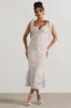 Caserta | White & Red Floral Buttoned Midi Dress With Flared Hem sold by Club L London