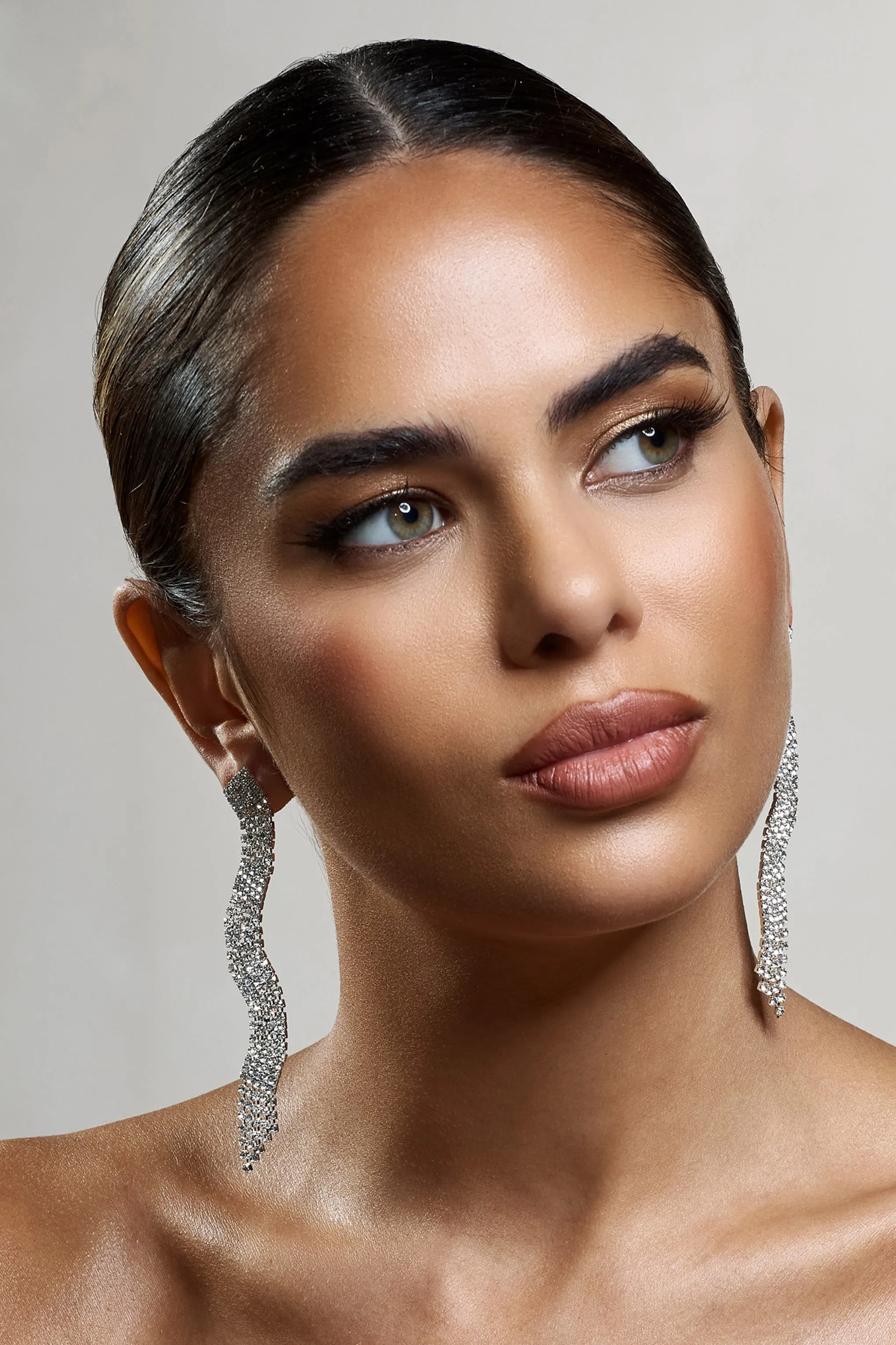 Swirl | Silver Diamante Curve Tassel Earrings sold by Club L London product image thumbnail 2