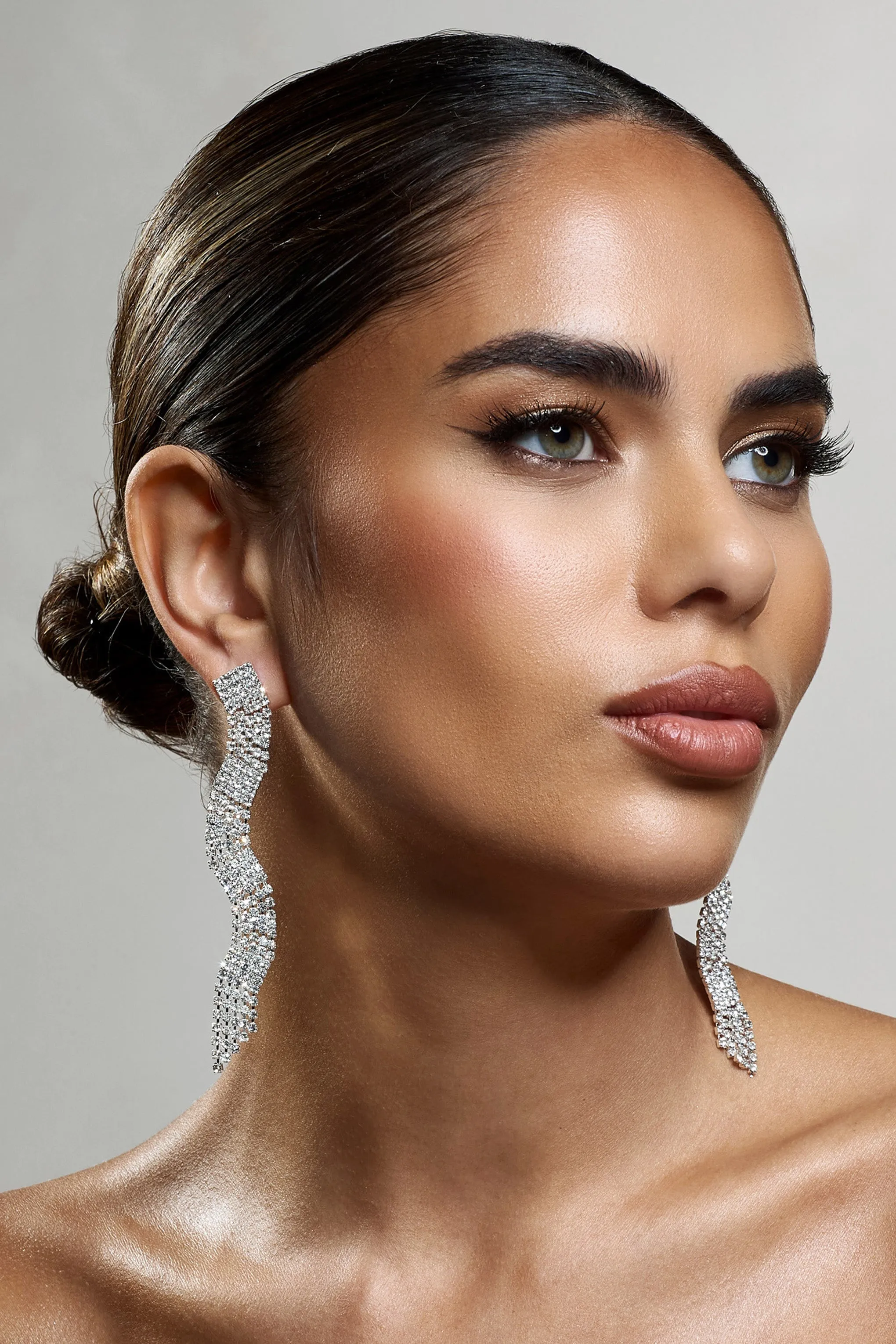 Swirl | Silver Diamante Curve Tassel Earrings sold by Club L London product image thumbnail 3