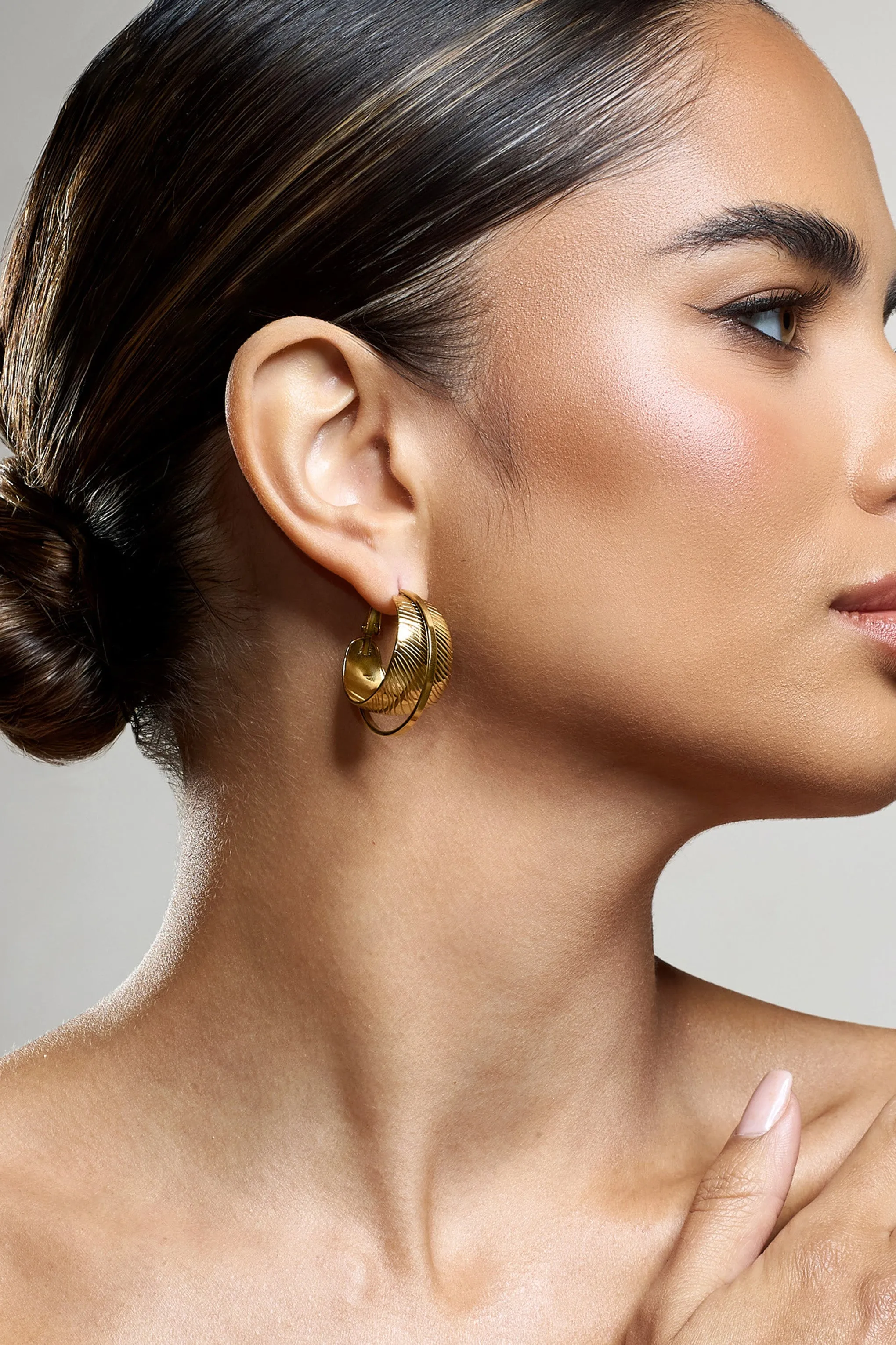 Liko | Gold Layered Hoop Earrings sold by Club L London