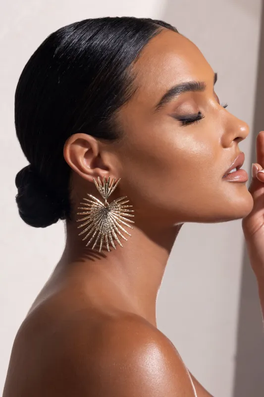 Giovanna | Gold Starburst Drop Earrings sold by Club L London