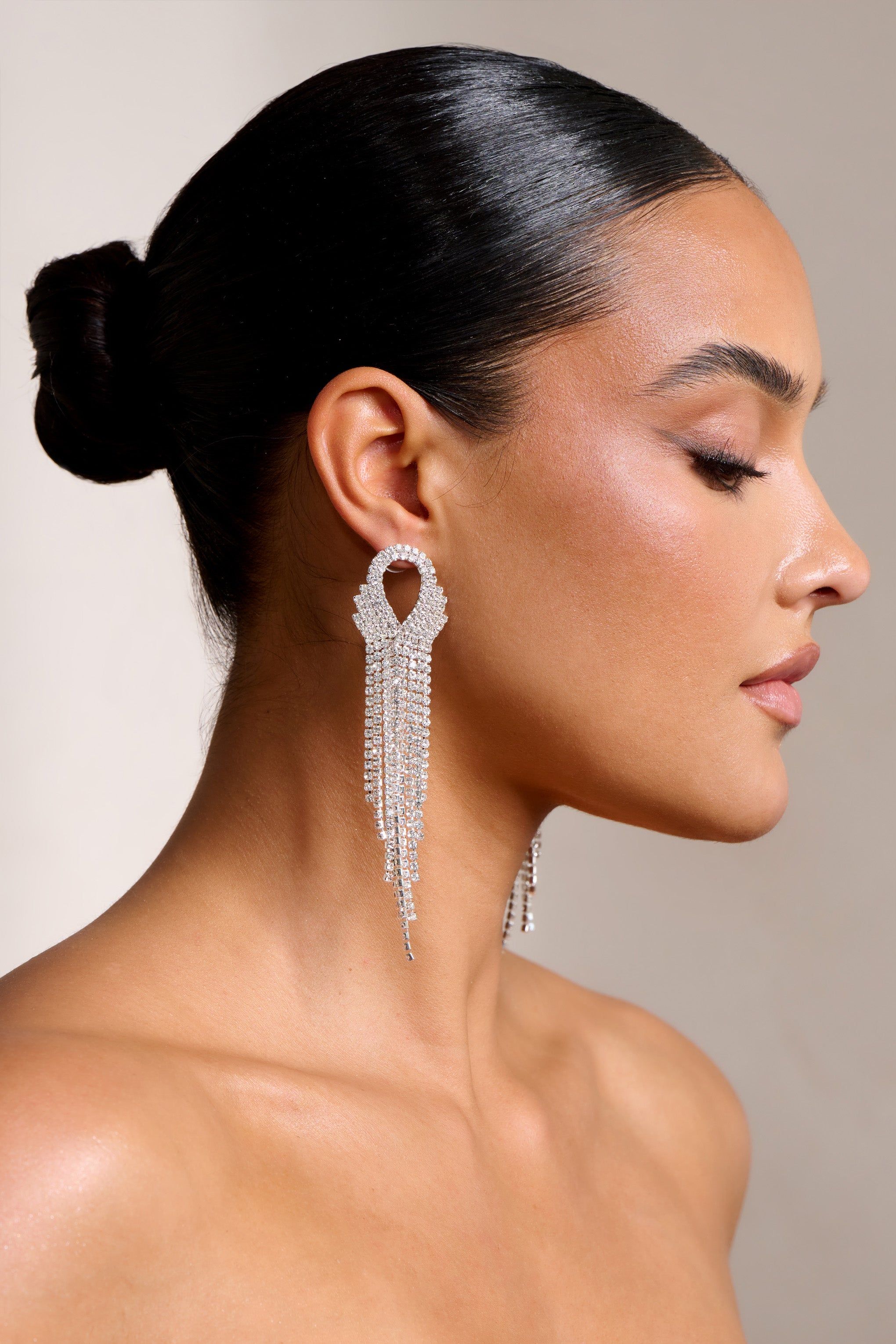 Stephanie | Silver Diamante Chain Drop Earrings sold by Club L London