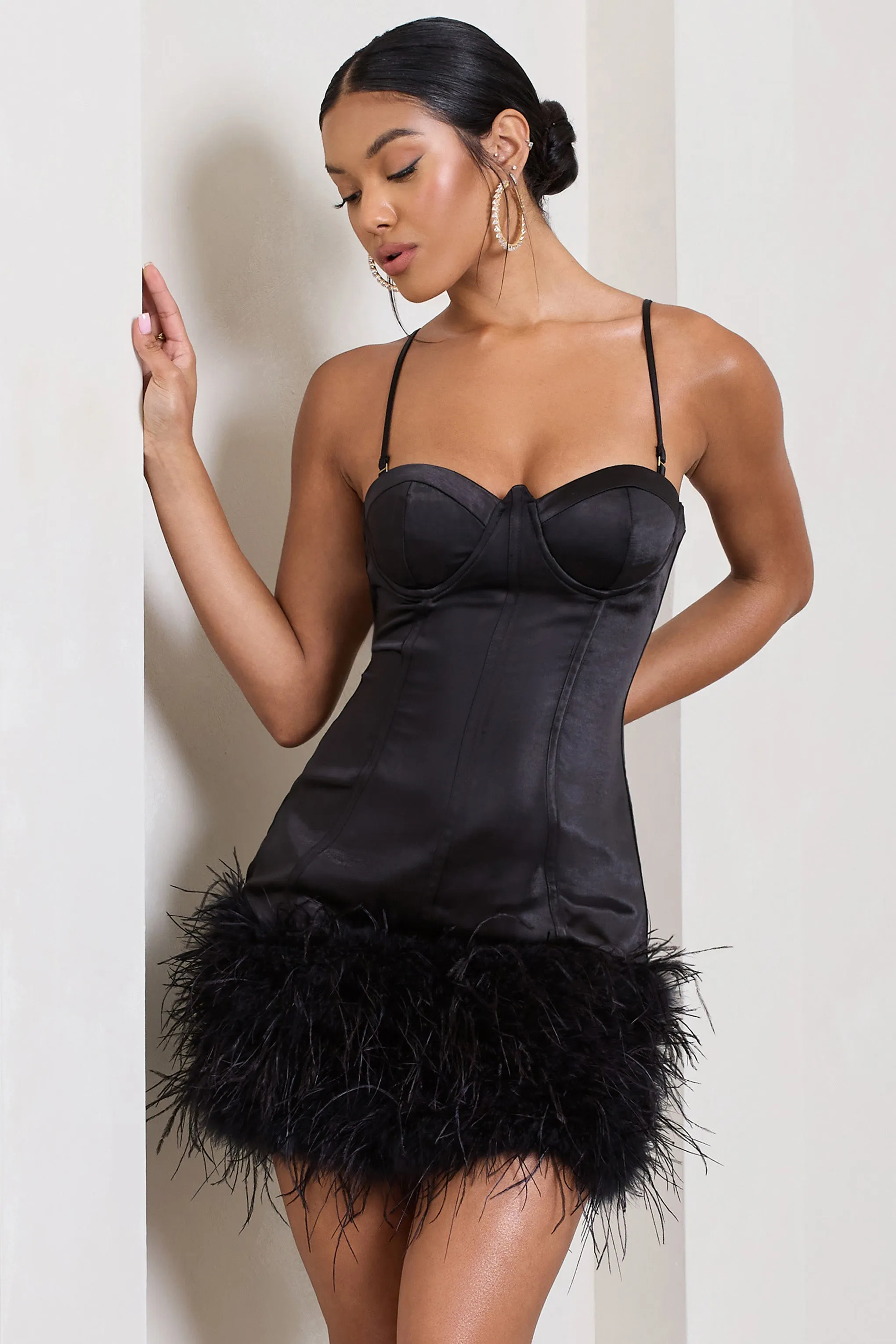 Vampira | Black Satin Corset Feather Mini Dress sold by Club L London