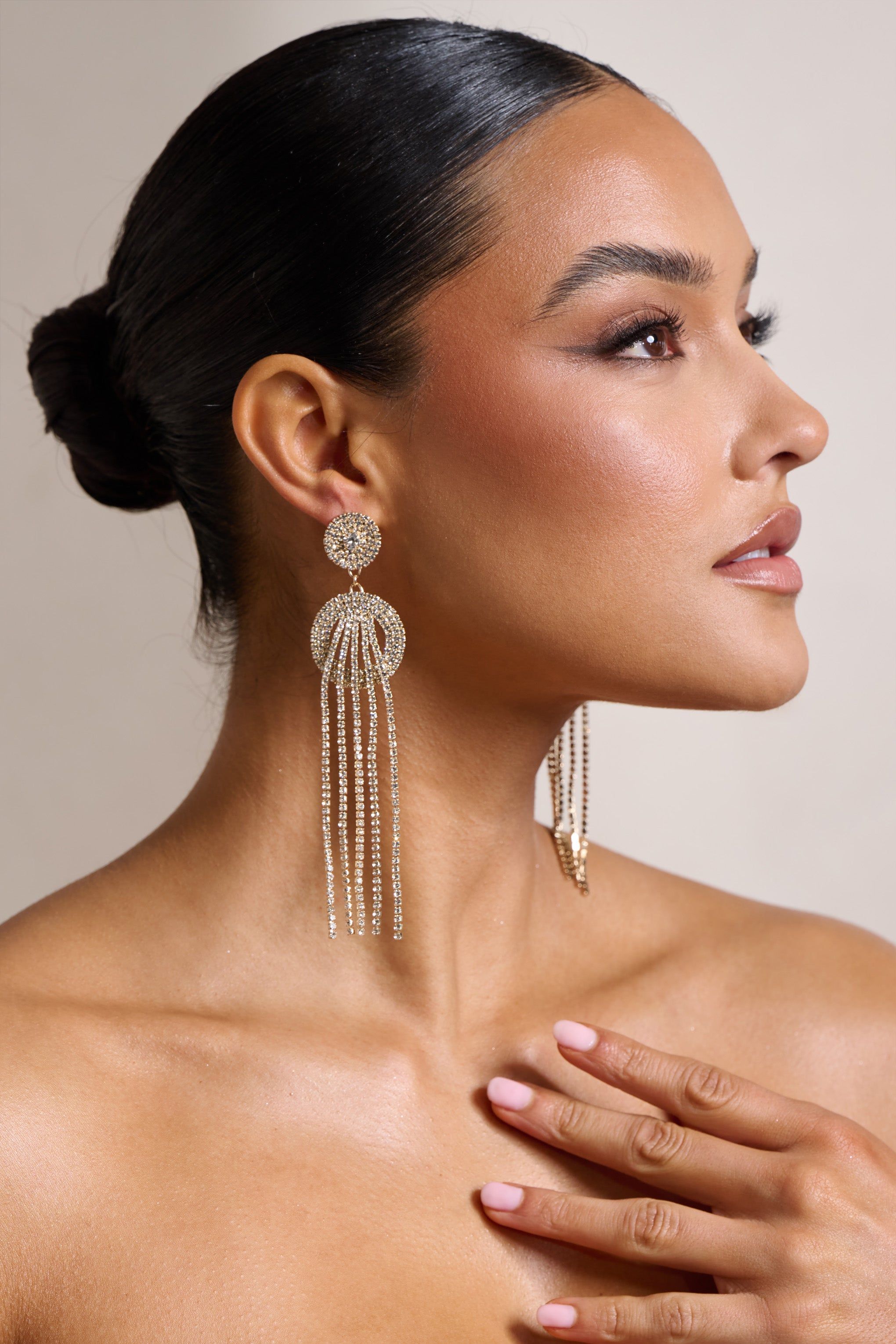 Casey | Gold Diamante Long Tassel Earrings sold by Club L London