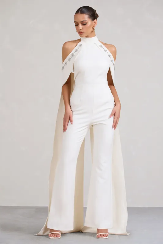 Angel | White High Neck Jumpsuit with Cold Shoulder Cape Sleeves sold by Club L London