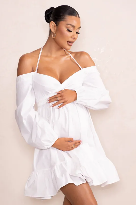 Kyra | White Babydoll Maternity Mini Dress with Long Cold Shoulder Puff Sleeves sold by Club L London